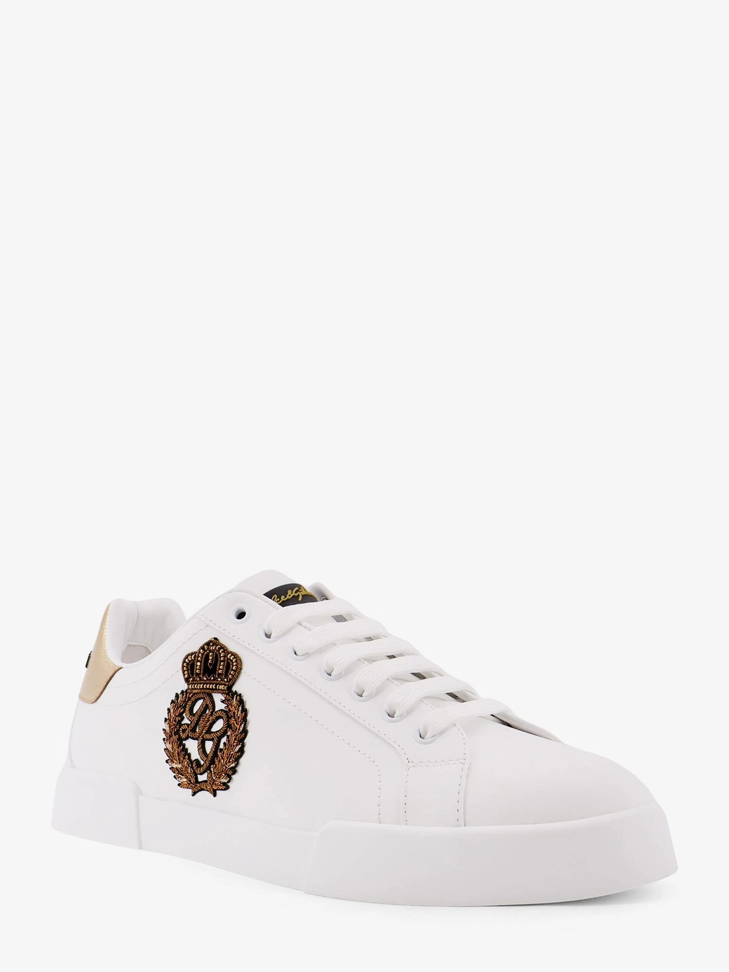 Leather sneakers with iconic patch logo on the side.webp
