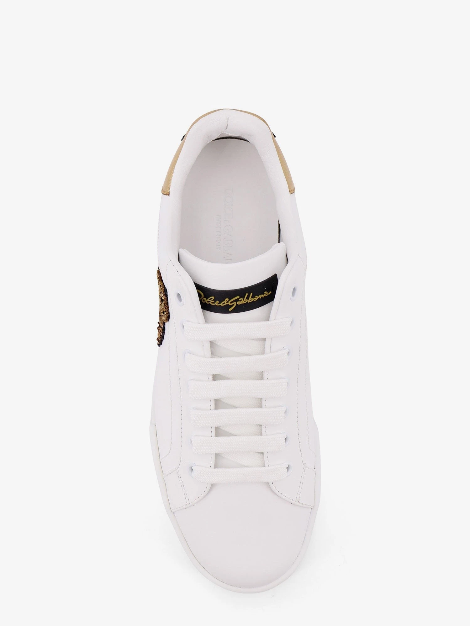 Leather sneakers with iconic patch logo on the side.webp