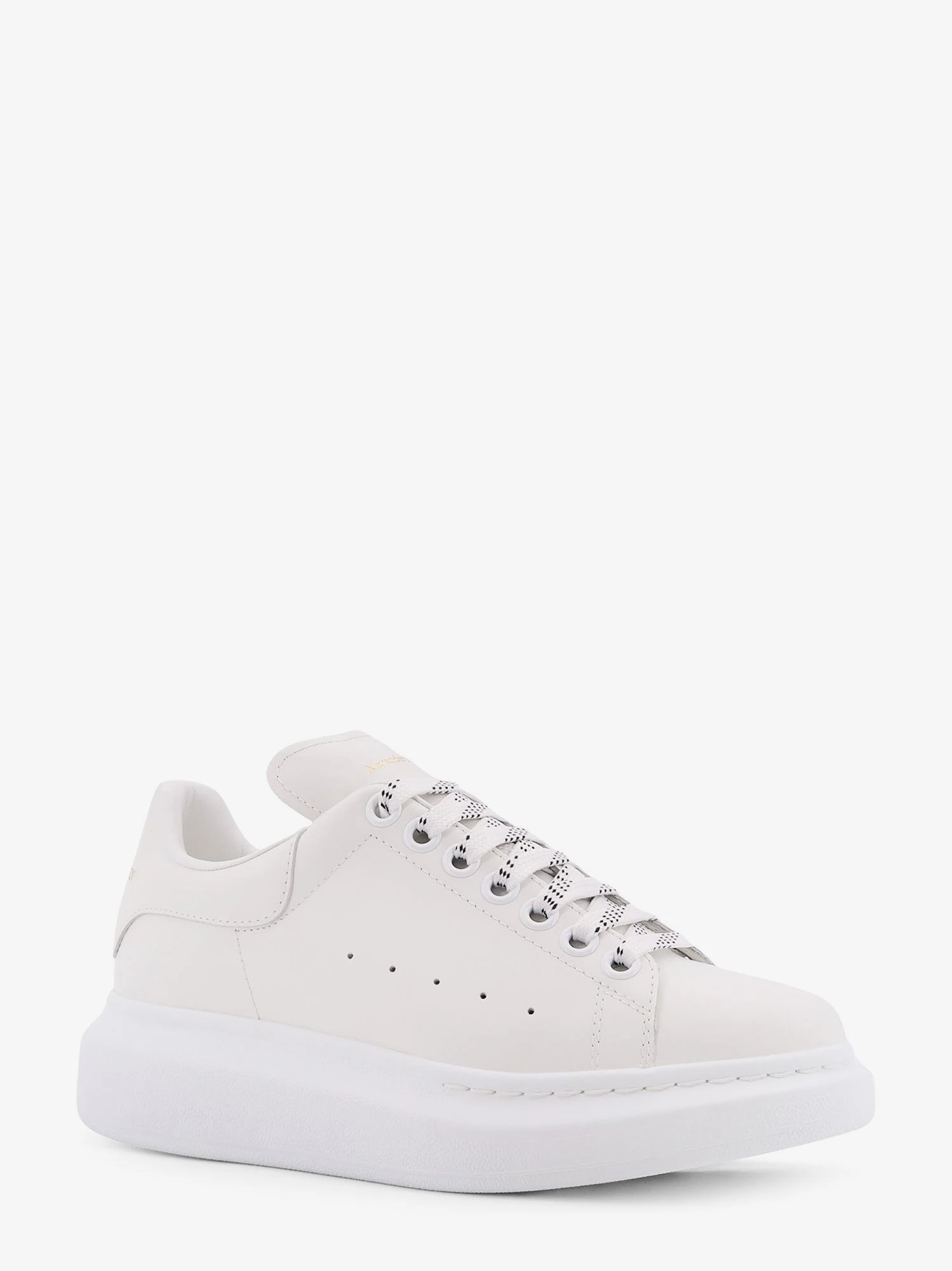 Oversized leather sneakers.webp