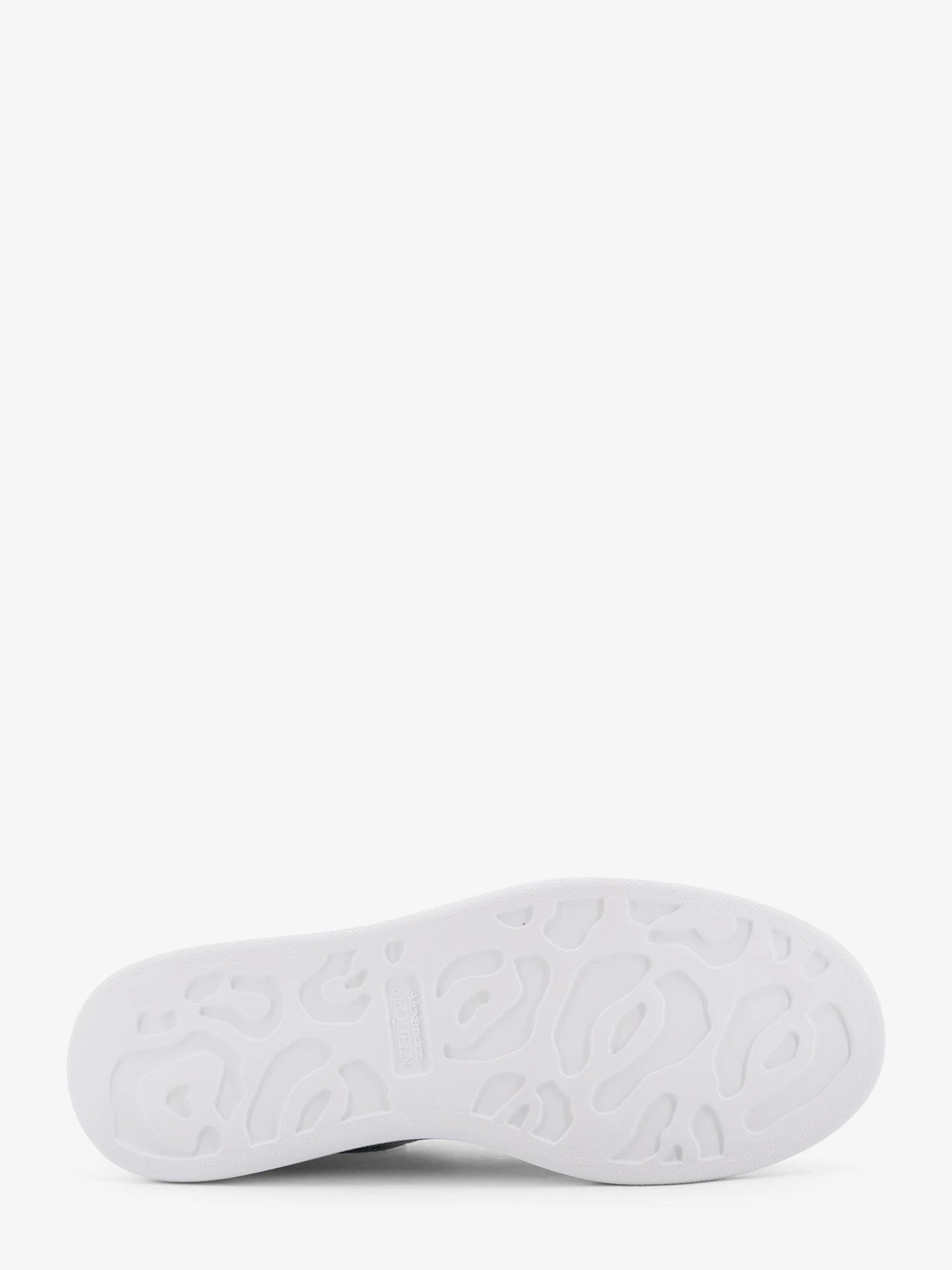 Oversized leather sneakers.webp