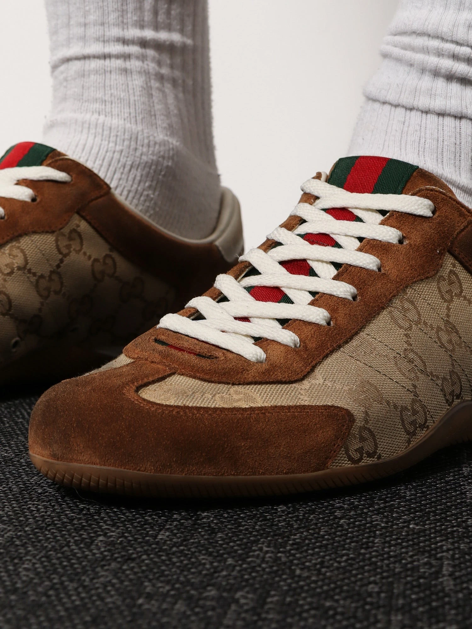 Gucci Shift suede sneakers with GG Supreme Fabric inserts.webp