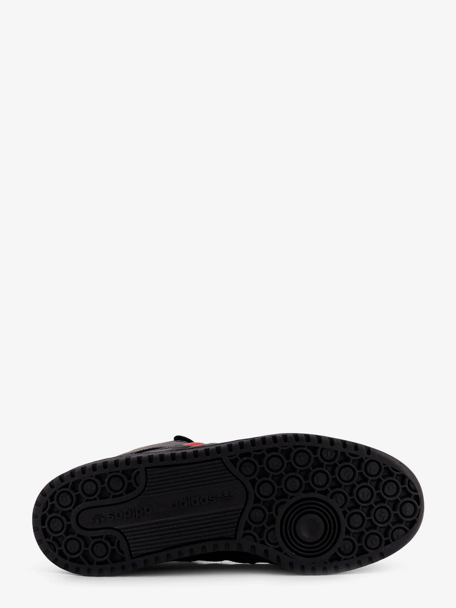 Leather sneakers with iconic logo on the side.webp
