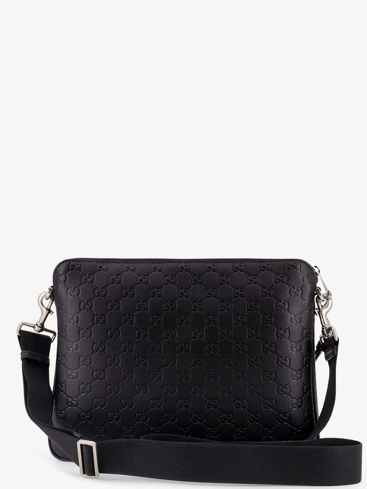 Leather GG Emblem crossbody bag with embossed GG motif.webp