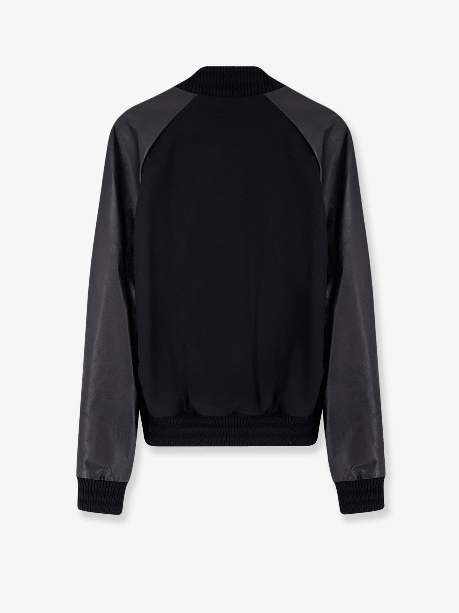 Wool jacket with leather sleeves.webp