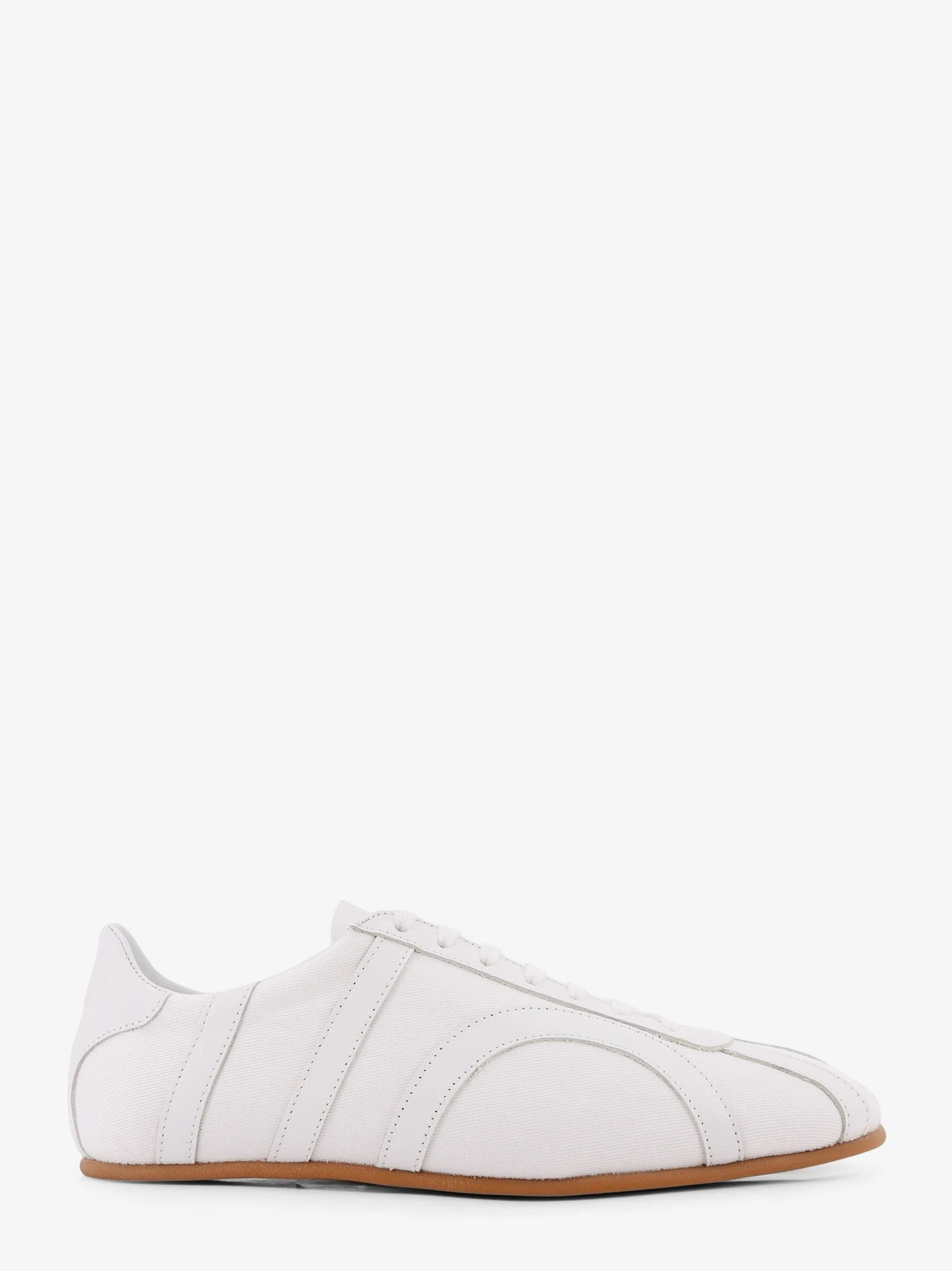 Canvas low-top sneakers with leather profiles.webp