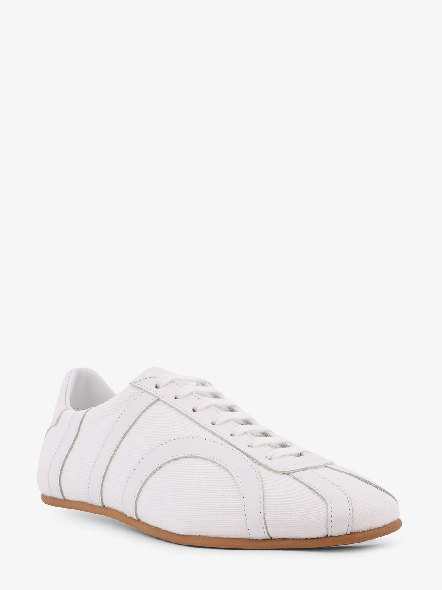 Canvas low-top sneakers with leather profiles.webp