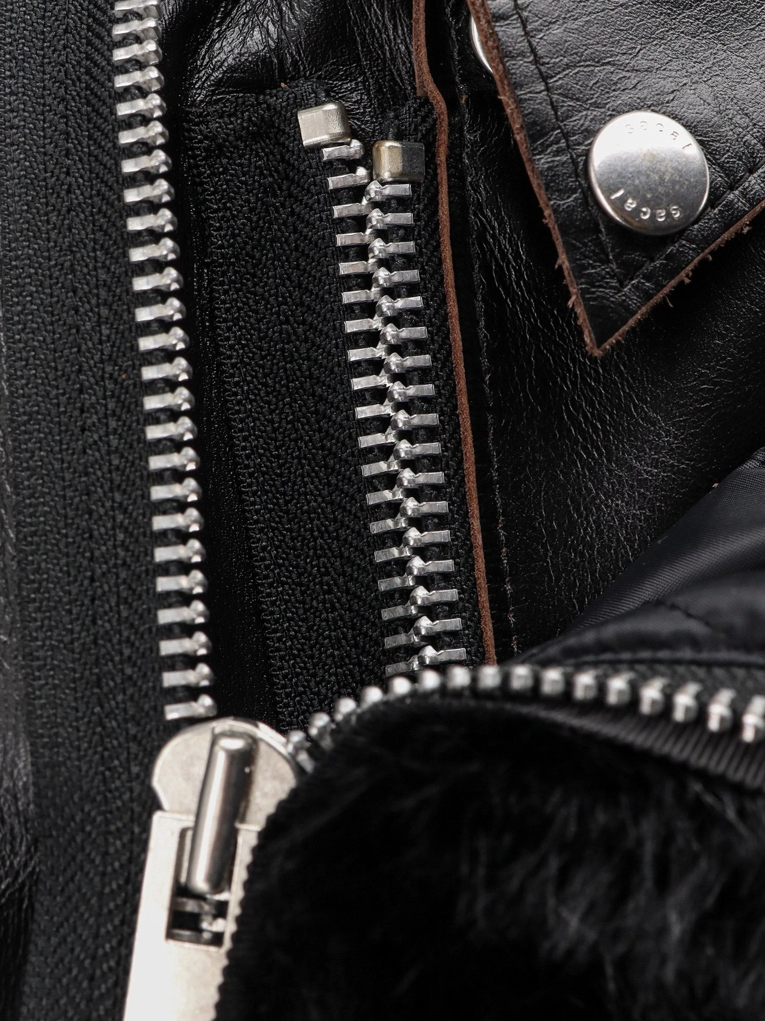 Leather Jacket with synthetic fur inserts.webp