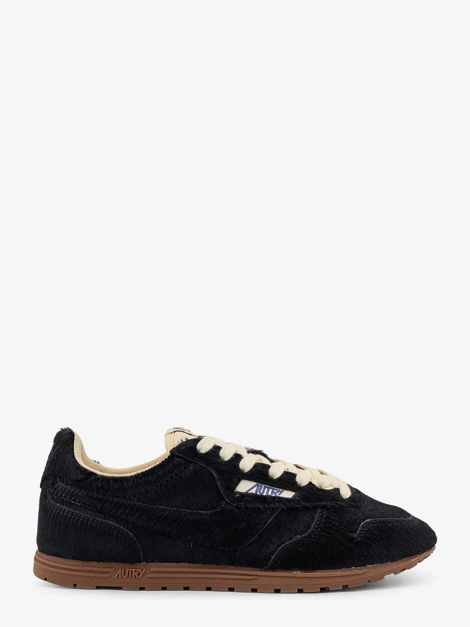 Low-top Windspin pony skin sneakers.webp