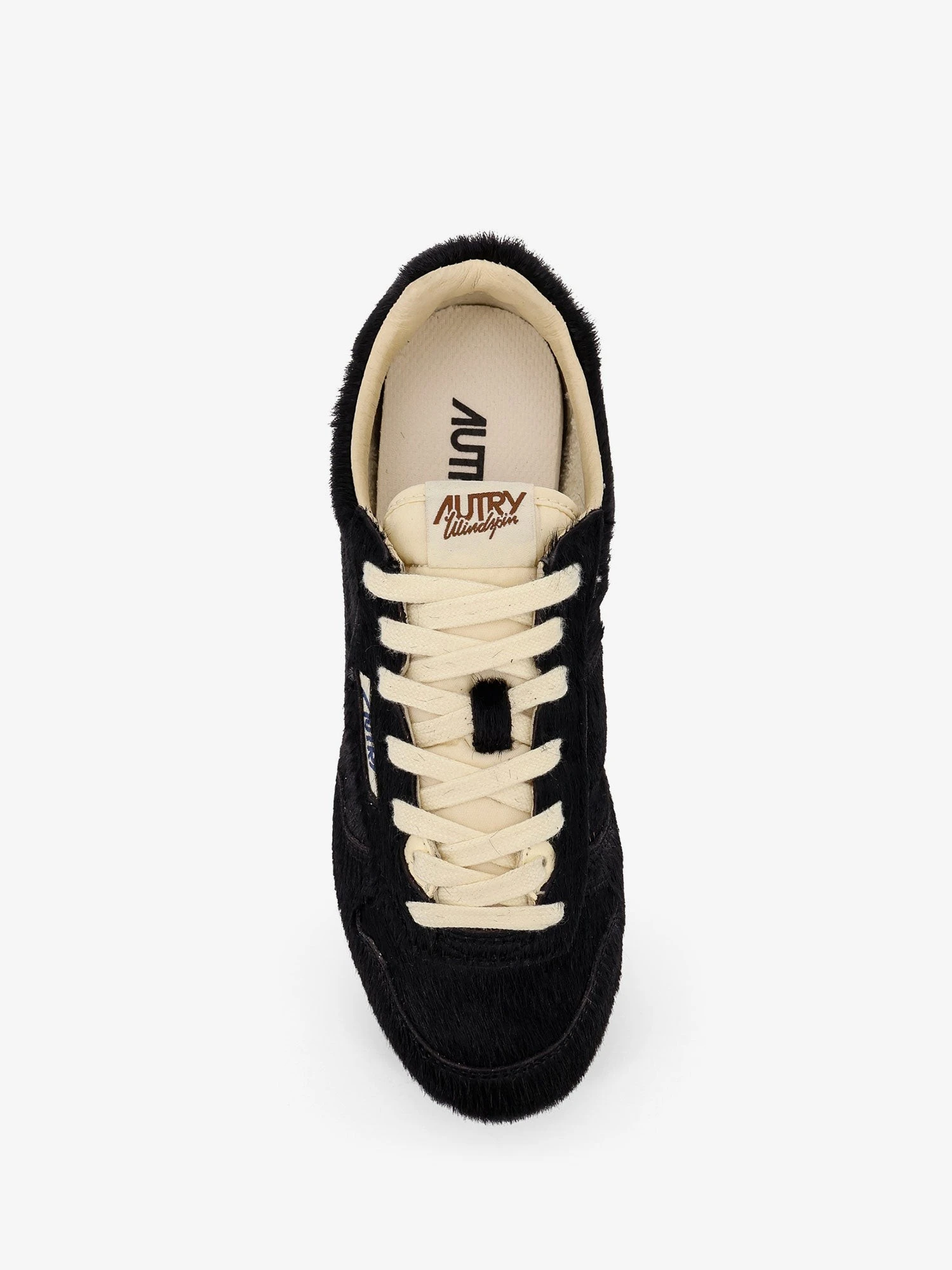 Low-top Windspin pony skin sneakers.webp