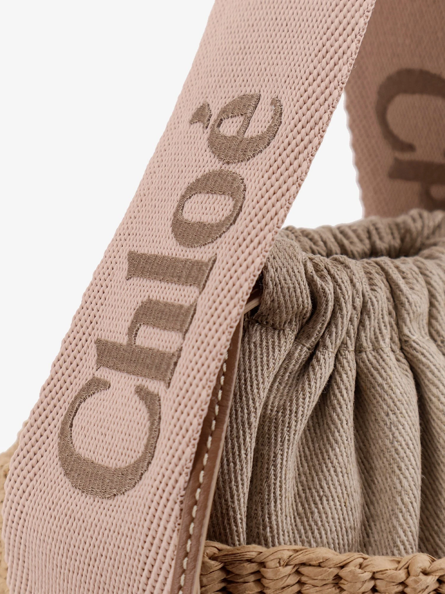 Woody raffia bucket bag.webp