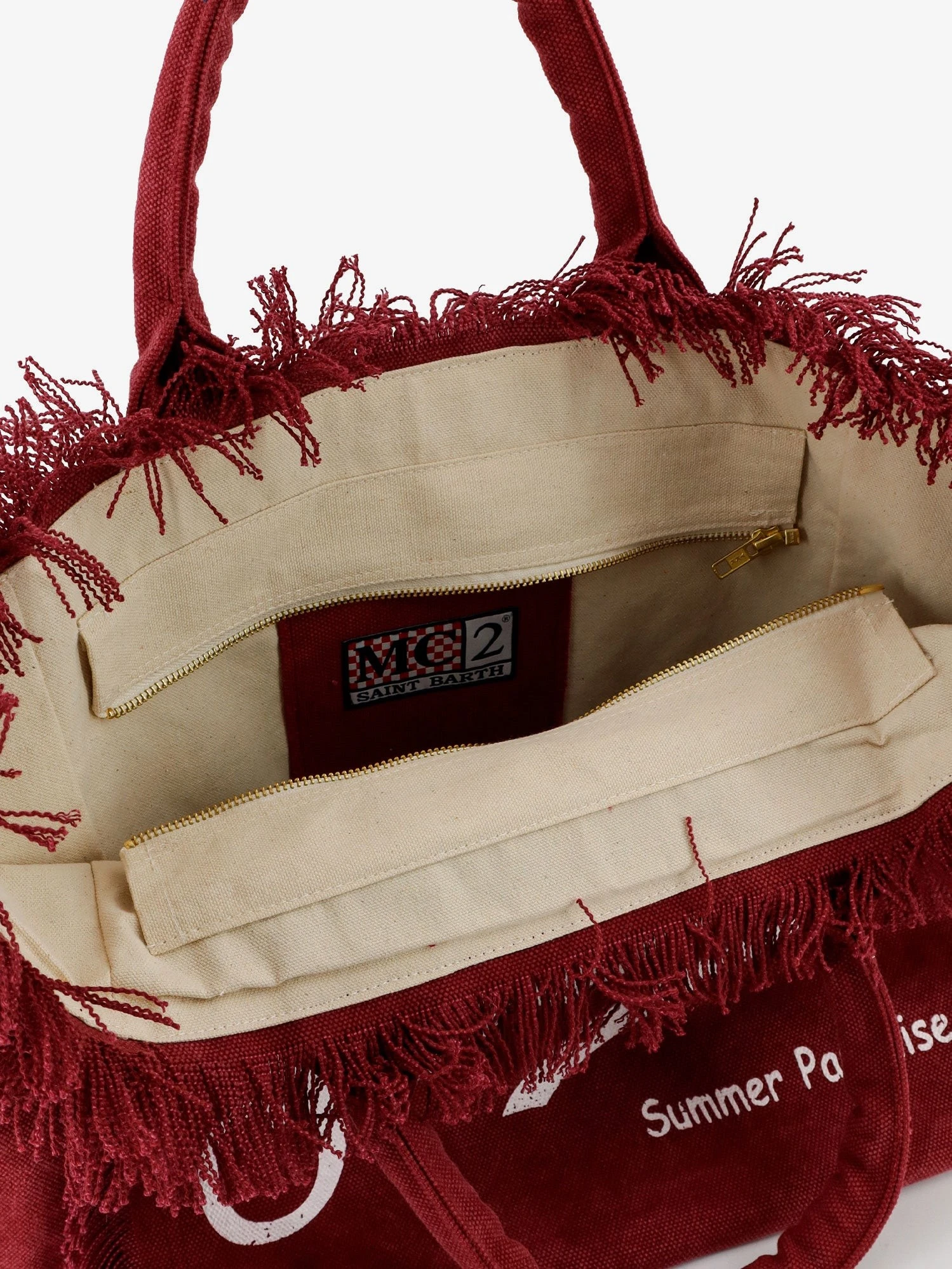 Vanity canvas shoulder bag with frayed edges.webp