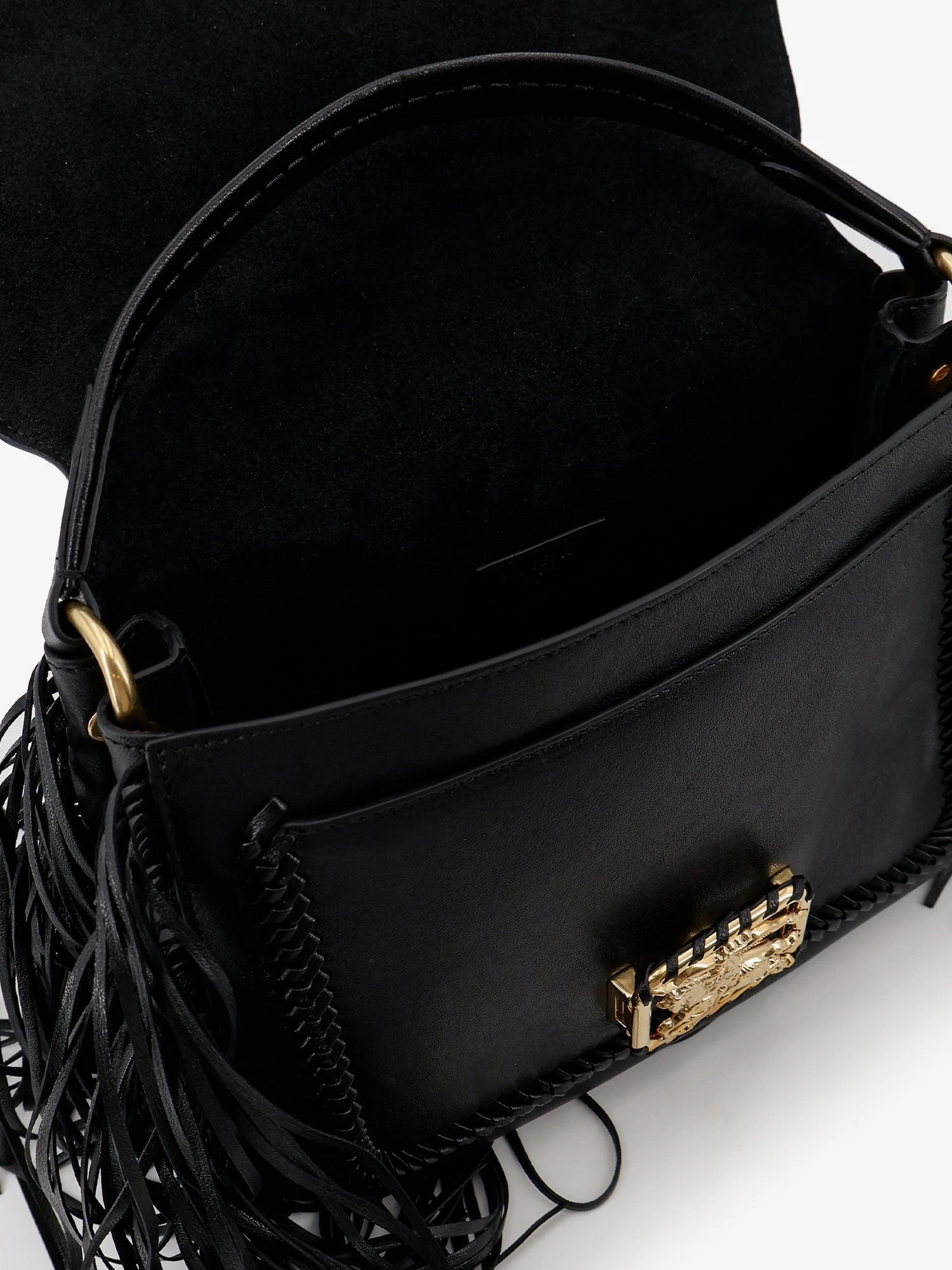 Rider leather shoulder bag with fringed edges.webp