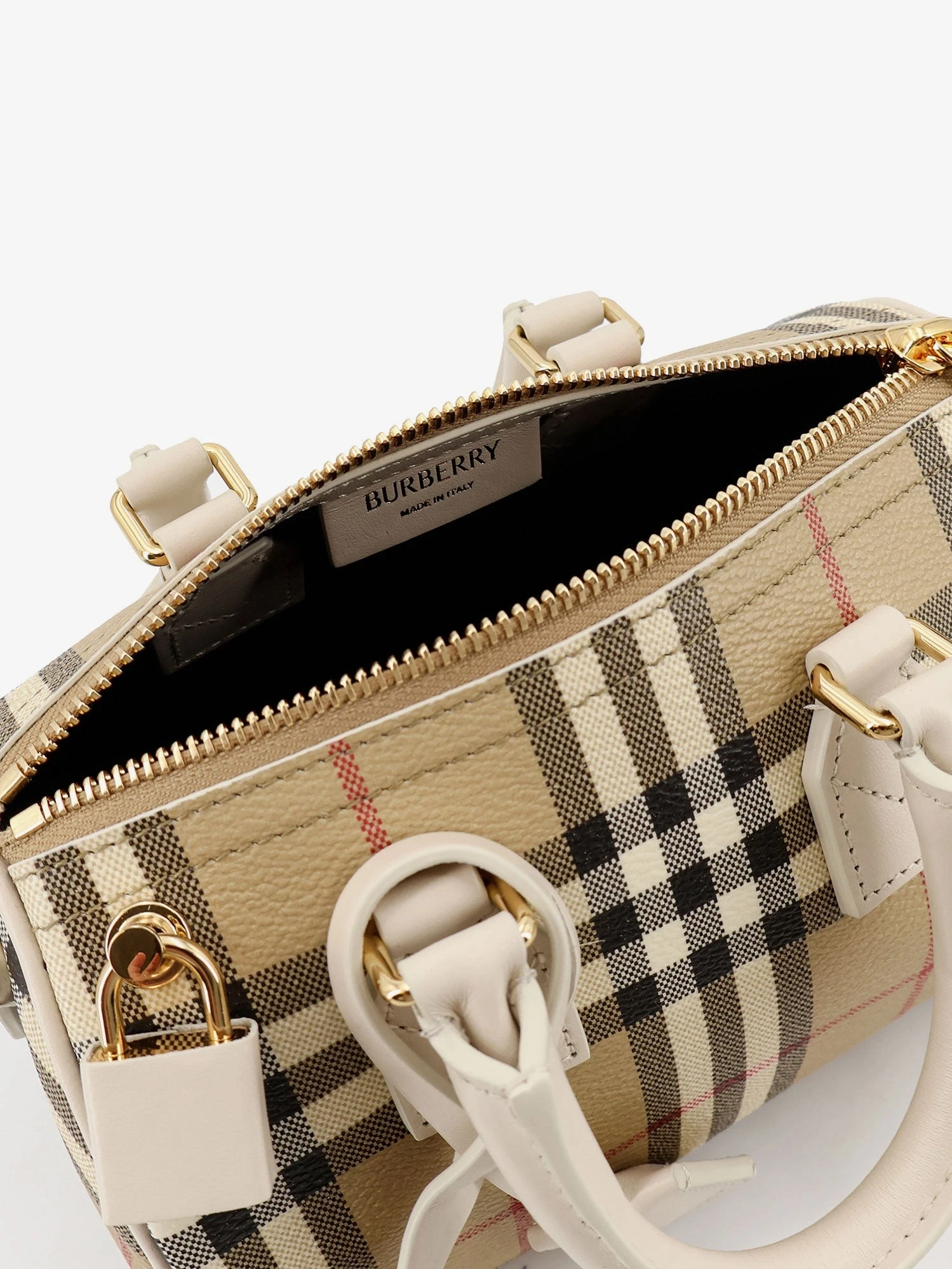 Bowling coated canvas crossbody bag with check motif.webp