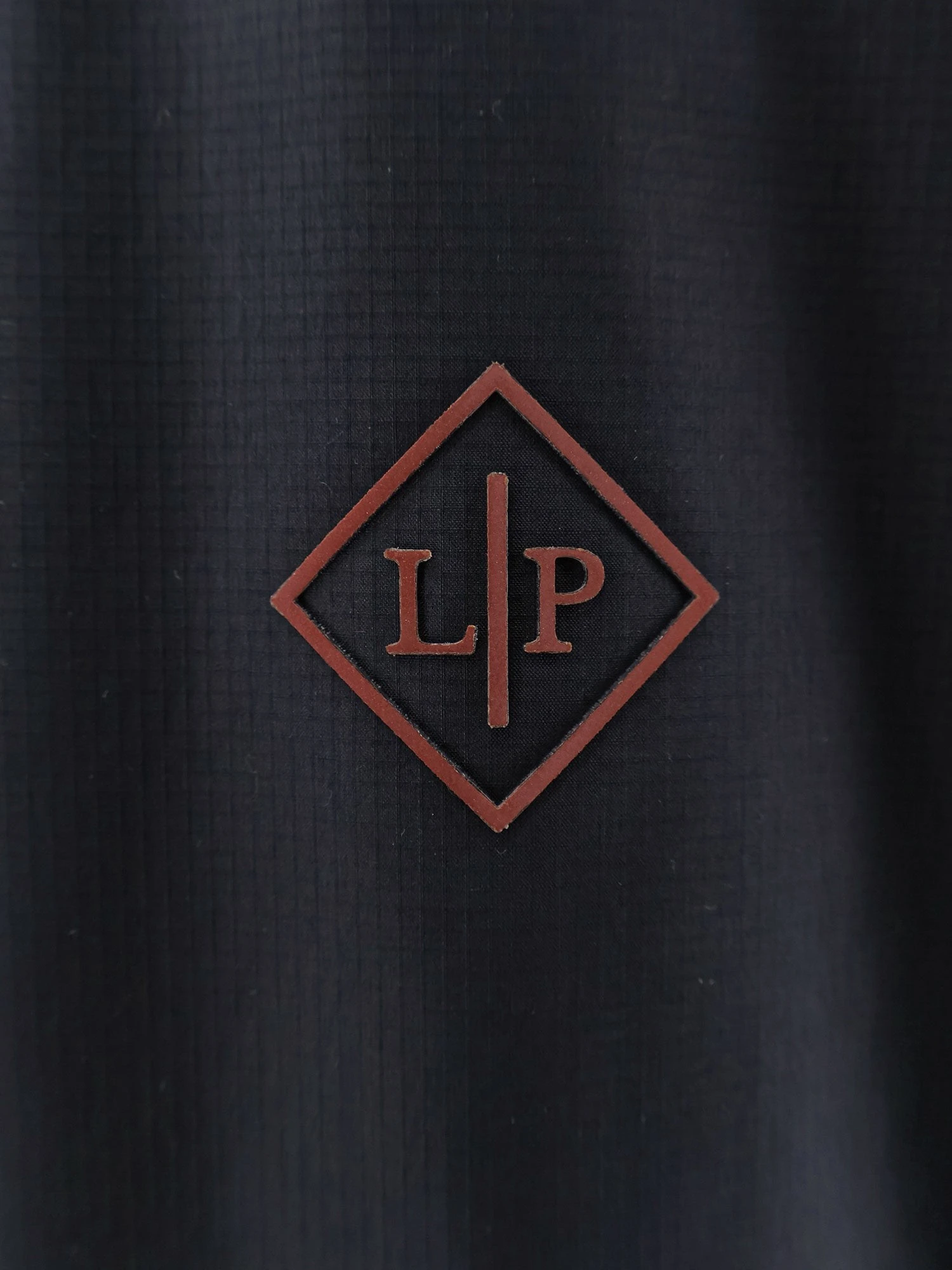 Mei Micro Ripstop fabric jacket.webp