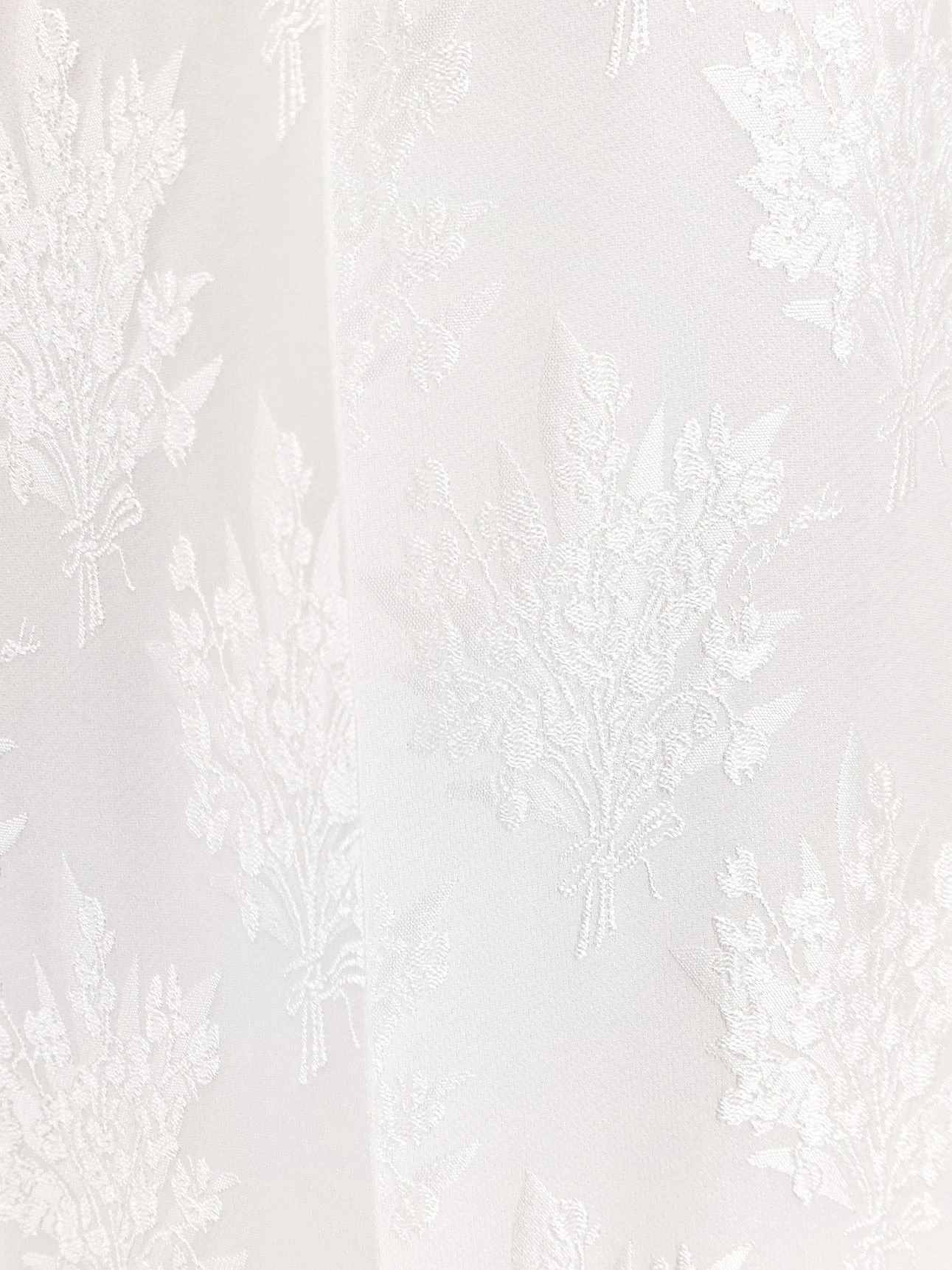 Jacquard silk trousers with floral motif.webp