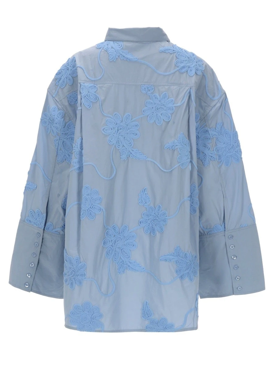 CAMICIA OVERSIZE CON DETTOGLIO FLOREALE.webp