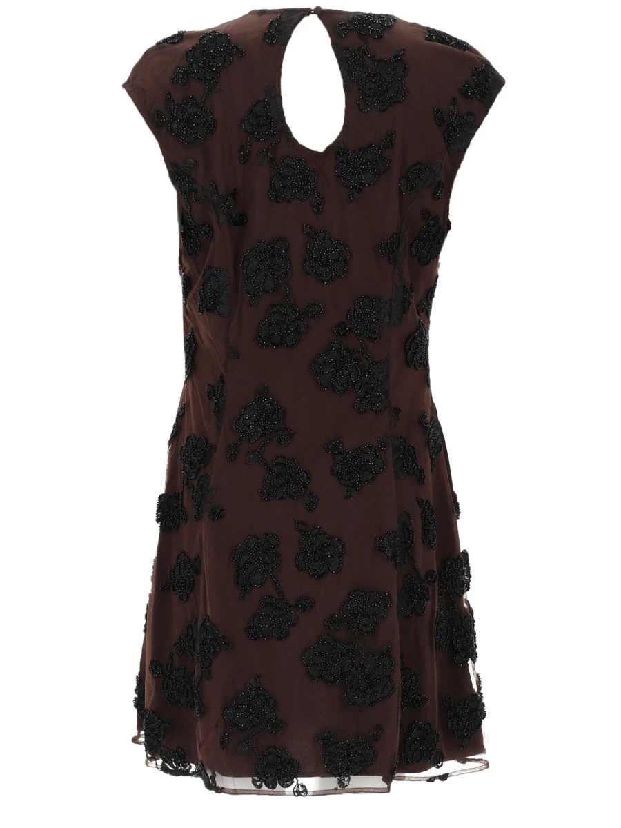 ABITO MINI CON DETTAGLI FLOREALI.webp