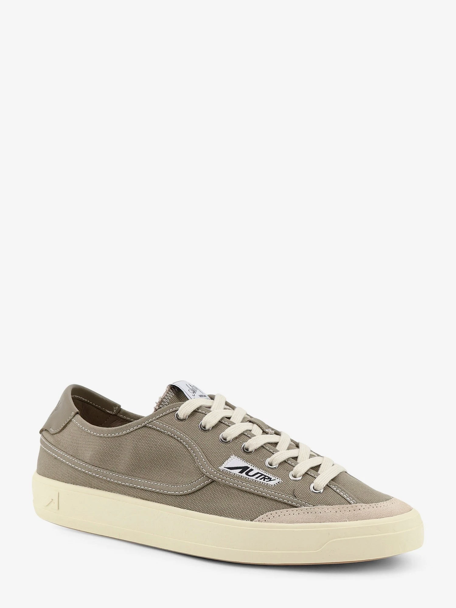 Windscape canvas sneakers with side logo label.webp
