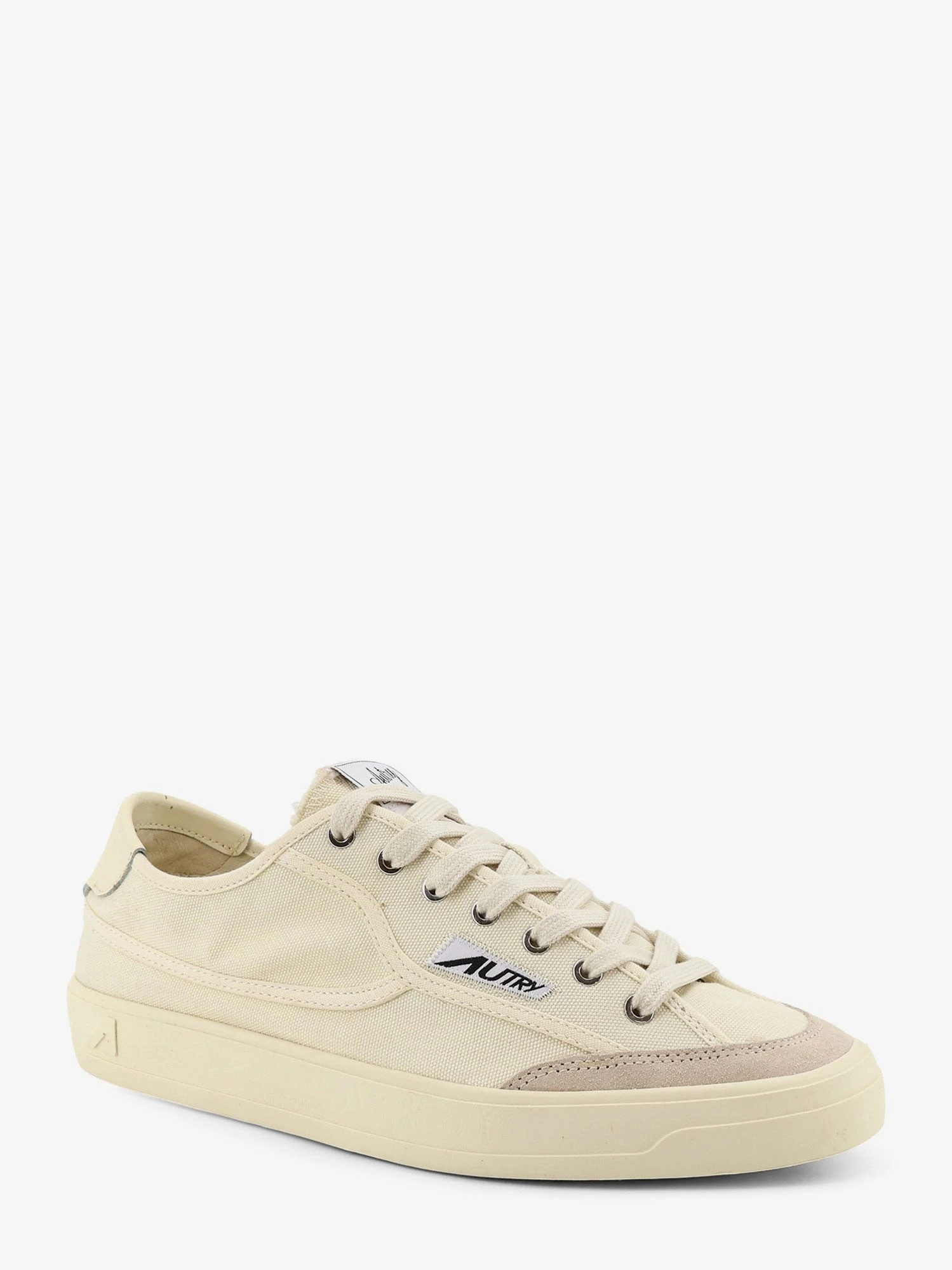 Windscape canvas sneakers with side logo label.webp