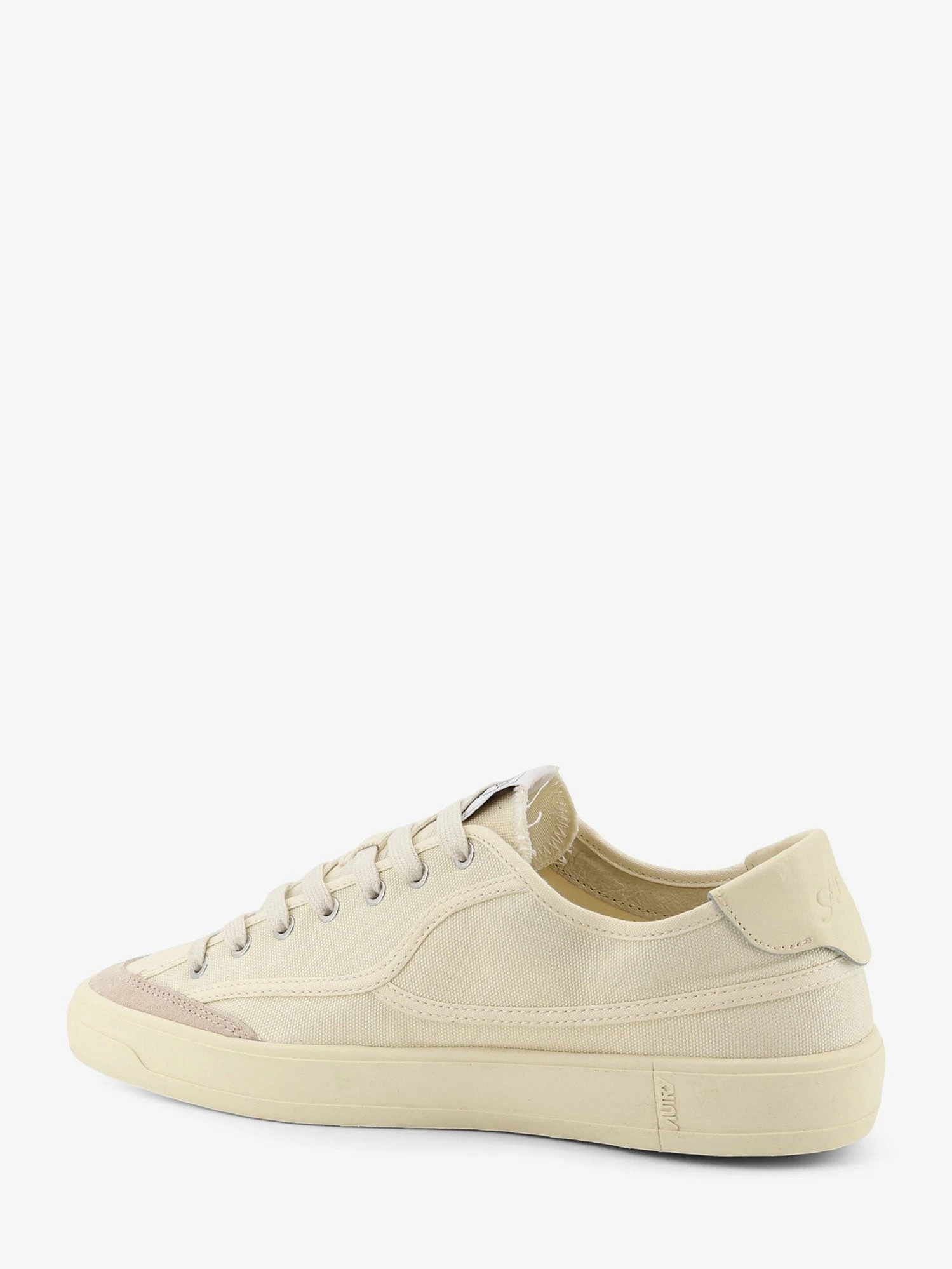 Windscape canvas sneakers with side logo label.webp