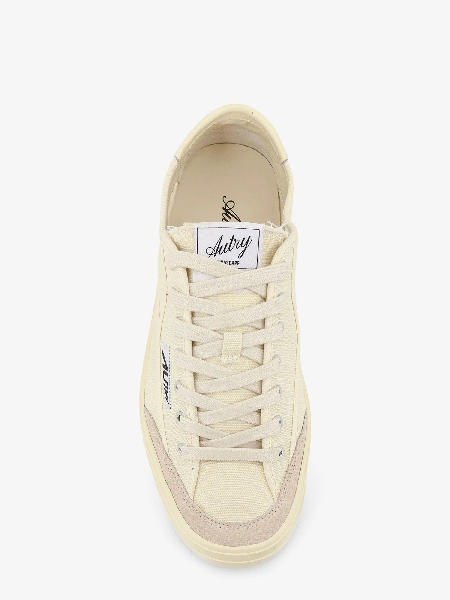 Windscape canvas sneakers with side logo label.webp