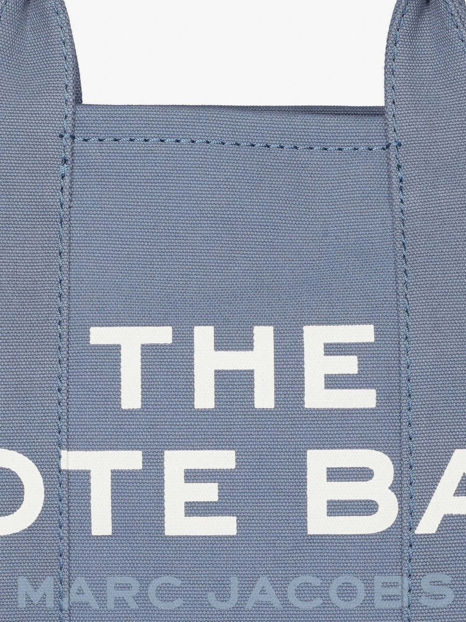 The Medium Tote Denim crossbody bag.webp