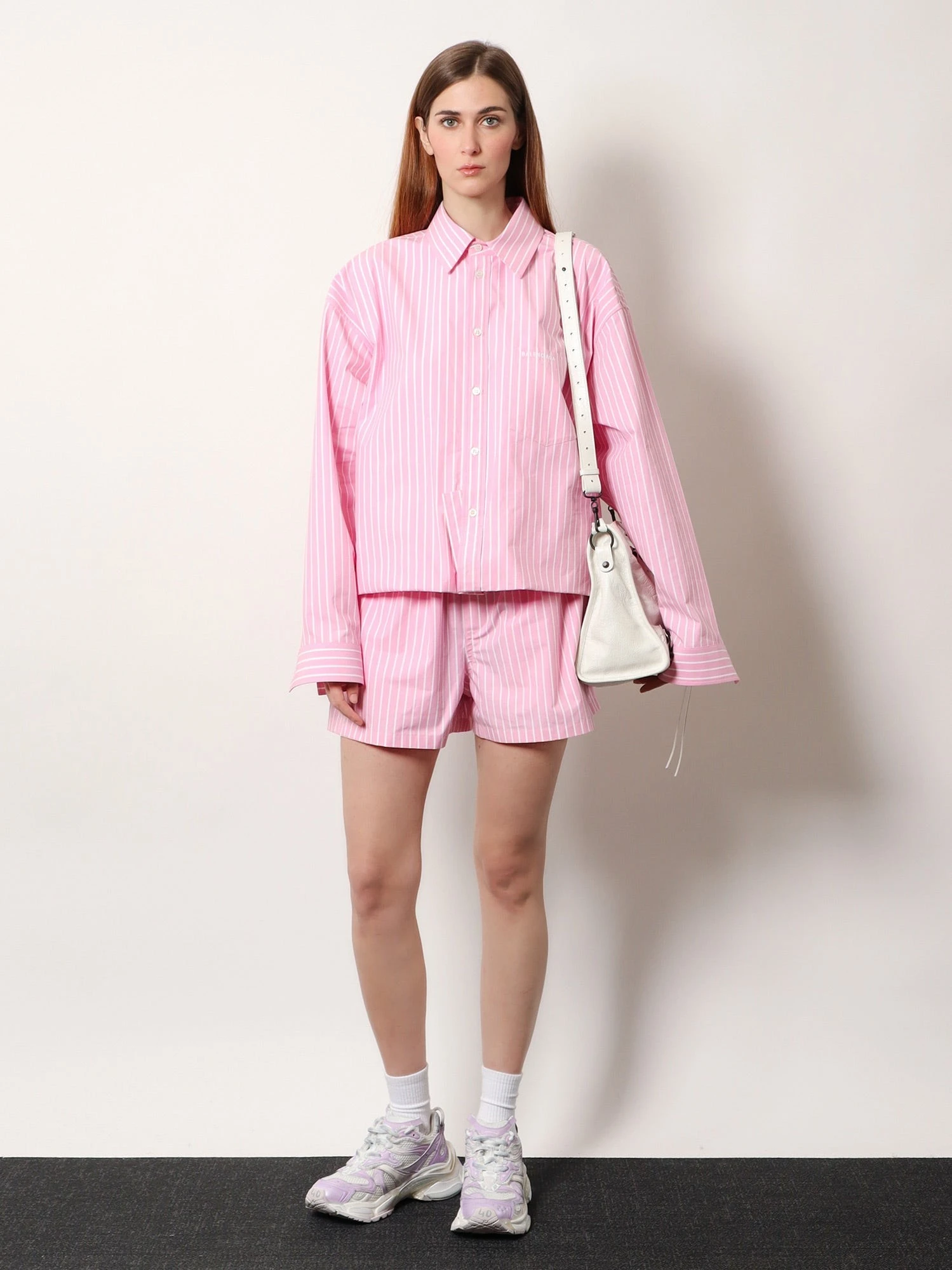 Folded striped cotton shirt.webp