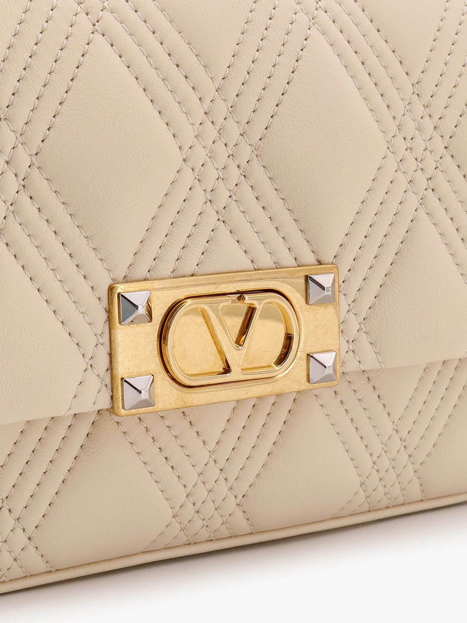 Valentino garavani quiltie 67 leather medium shoulder bag with chain.webp