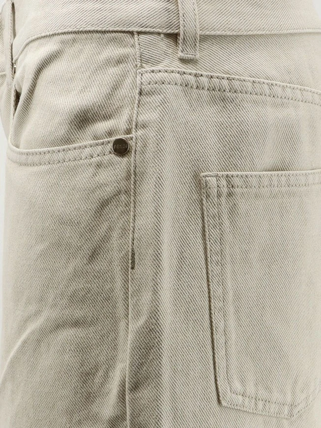 Beige denim trousers.webp