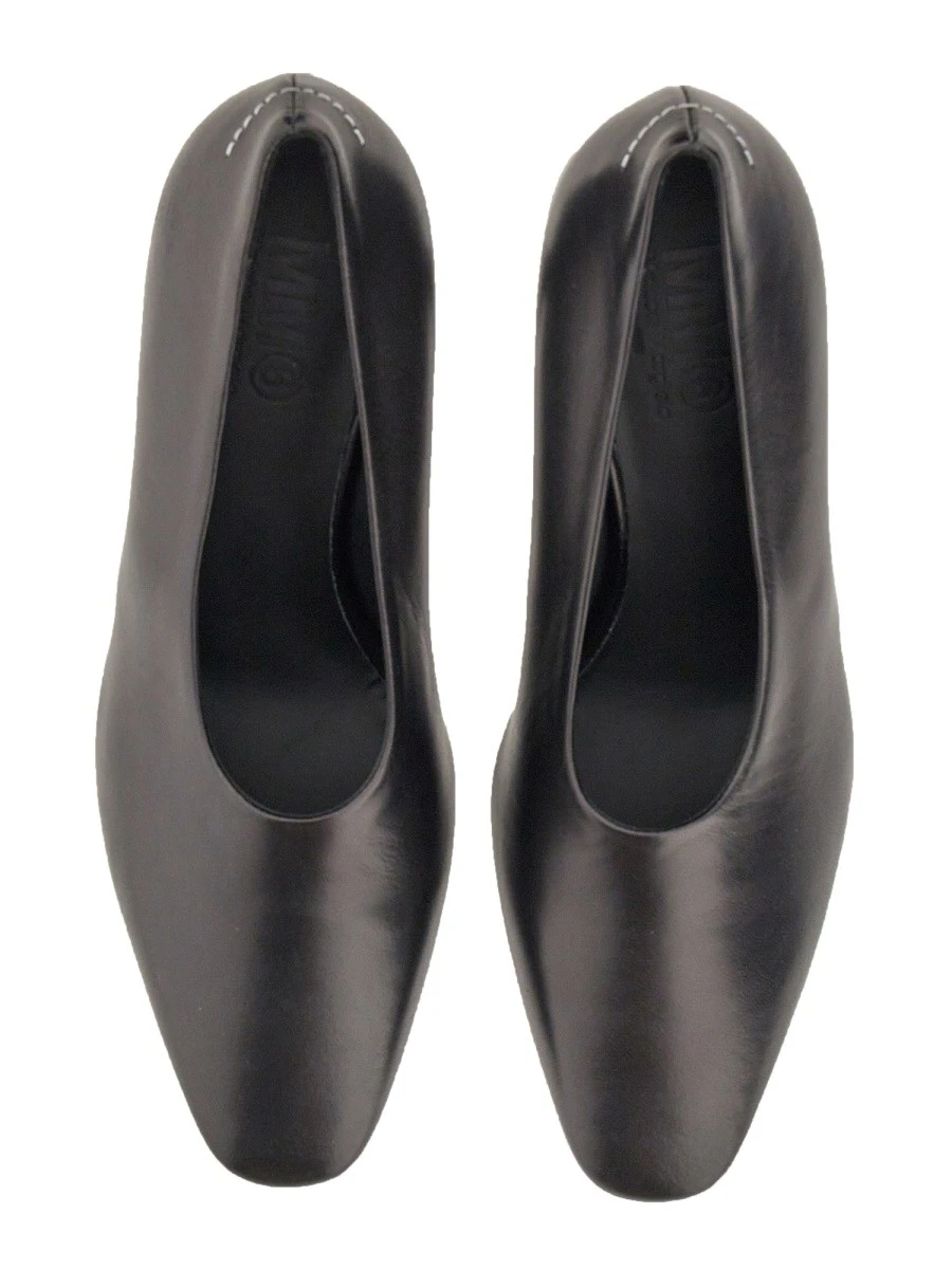 PUMP IN LEATHER.webp