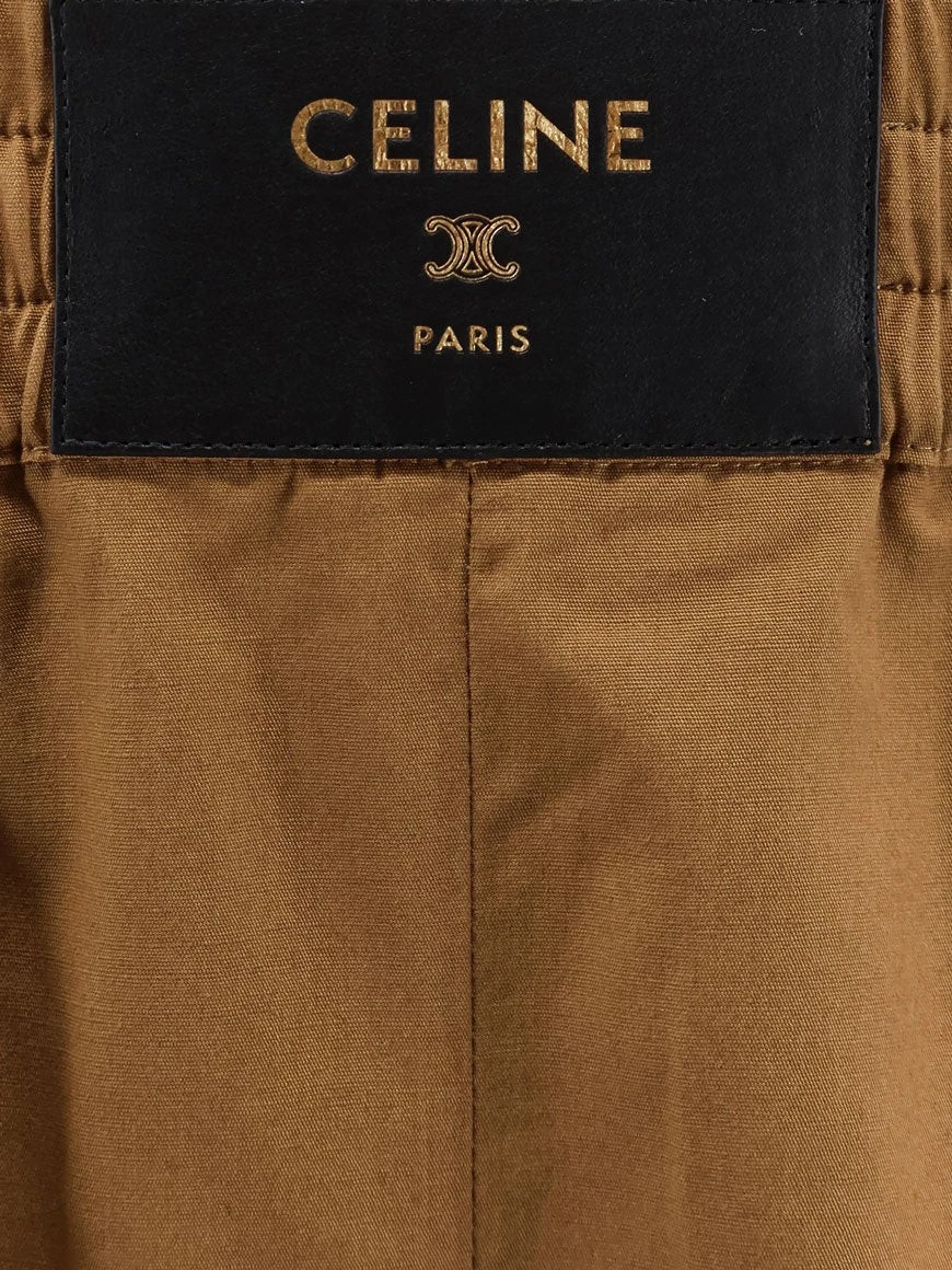 Cotton and linen shorts with Triomphe patch.webp
