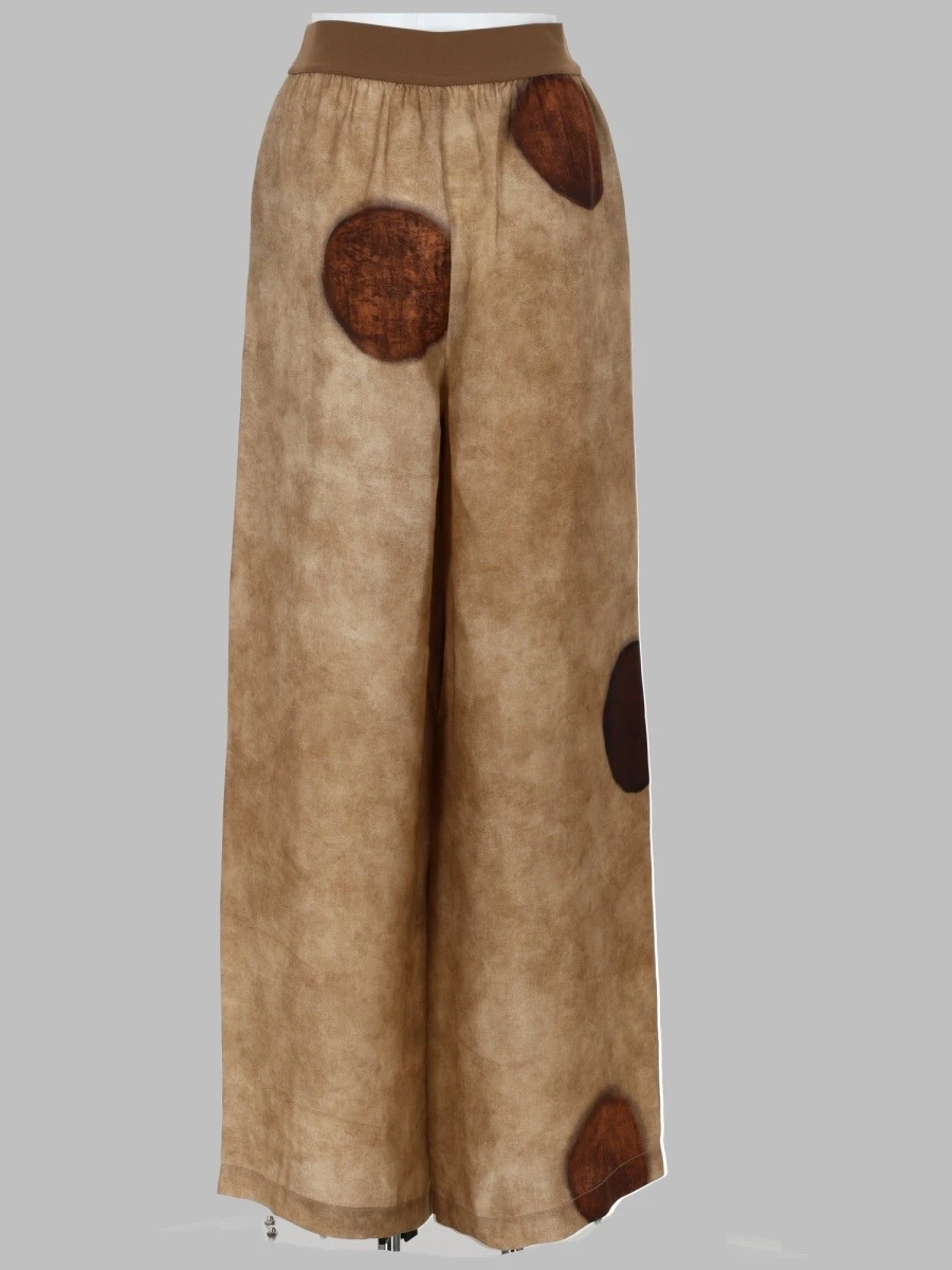 PANTALONE CON MACRO POIS.webp