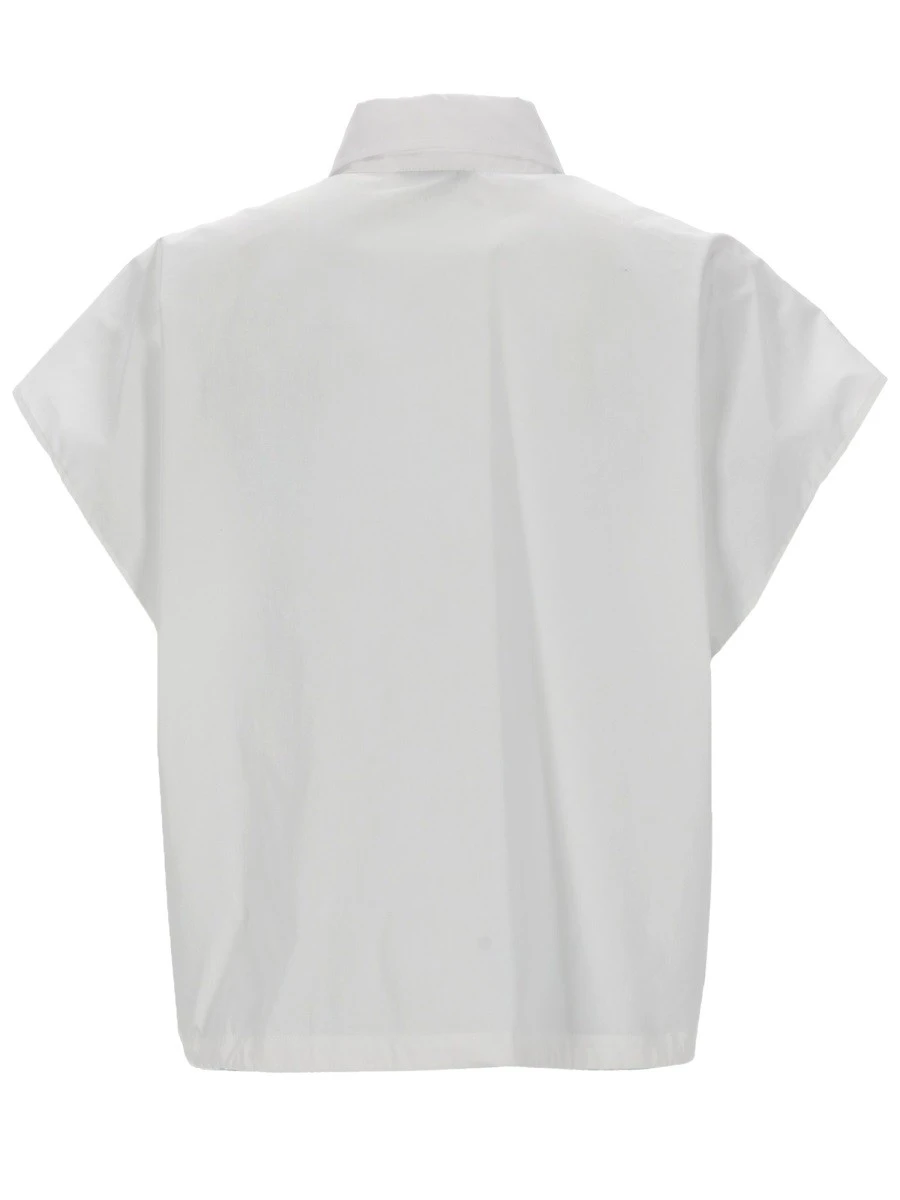 CAMICIA CON RUCHES.webp