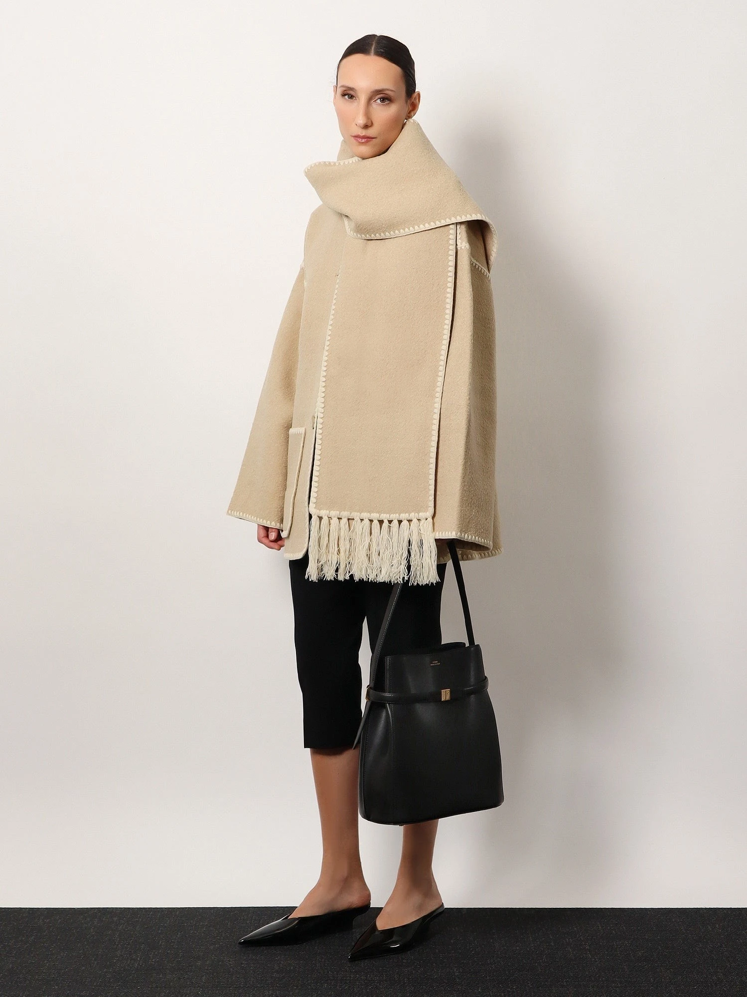 Belted leather bucket bag.webp