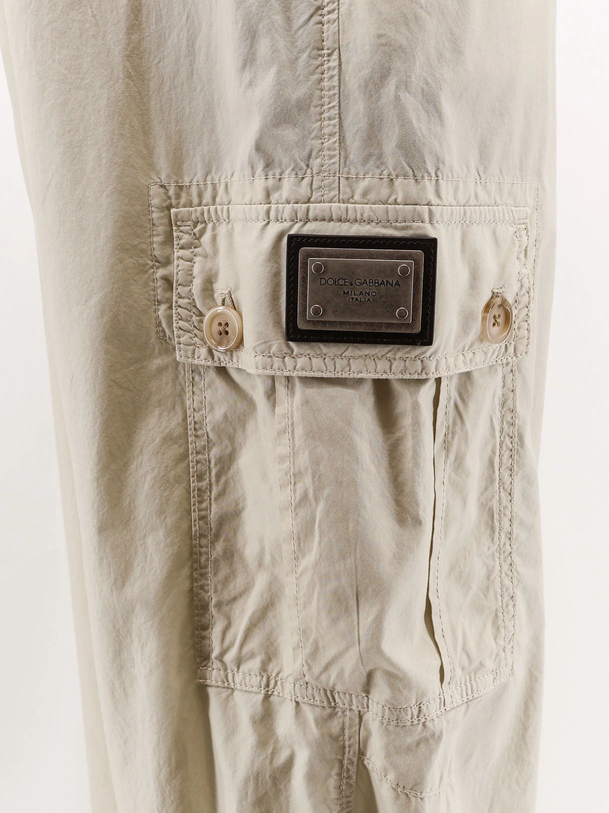 Cotton trousers with applied pockets.webp