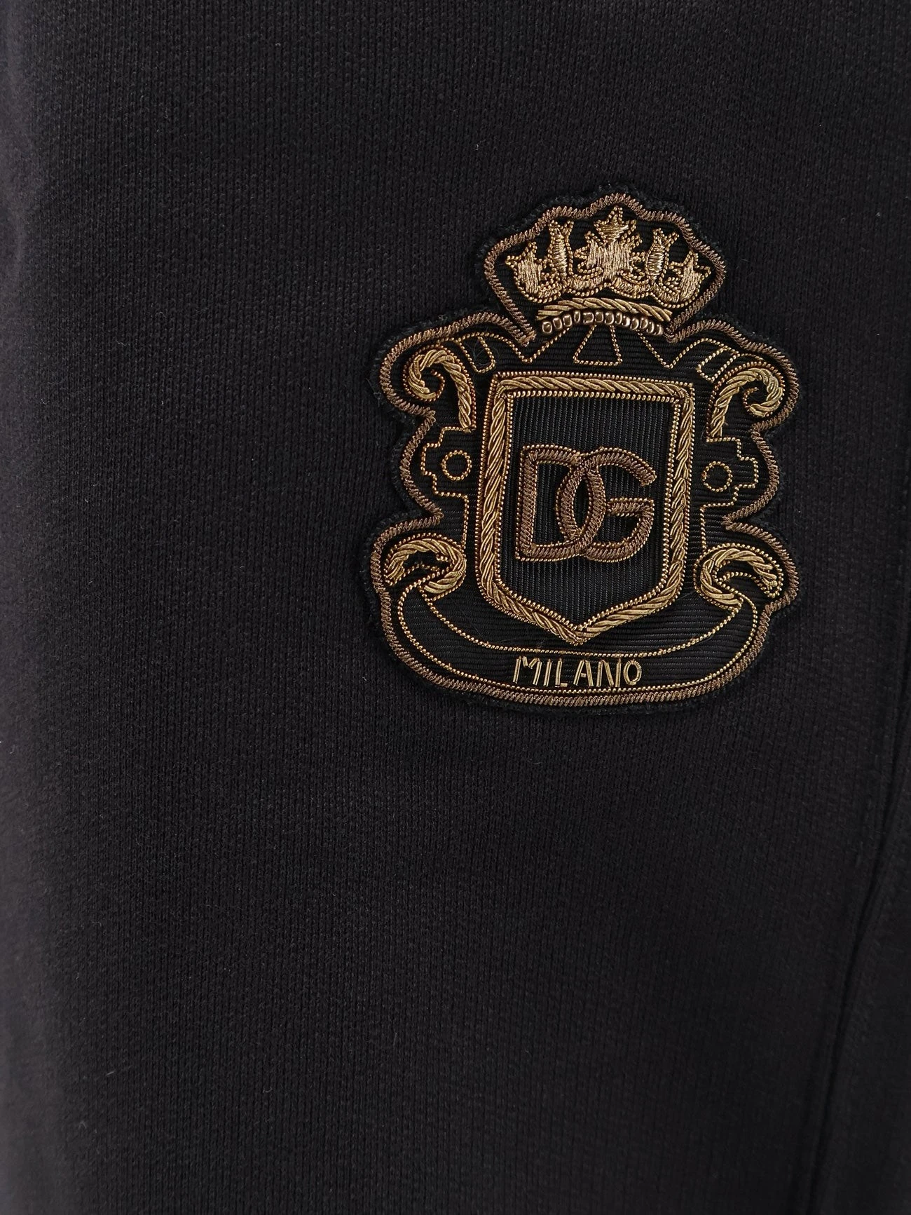 Cotton Bermuda shorts with heraldic logo patch.webp