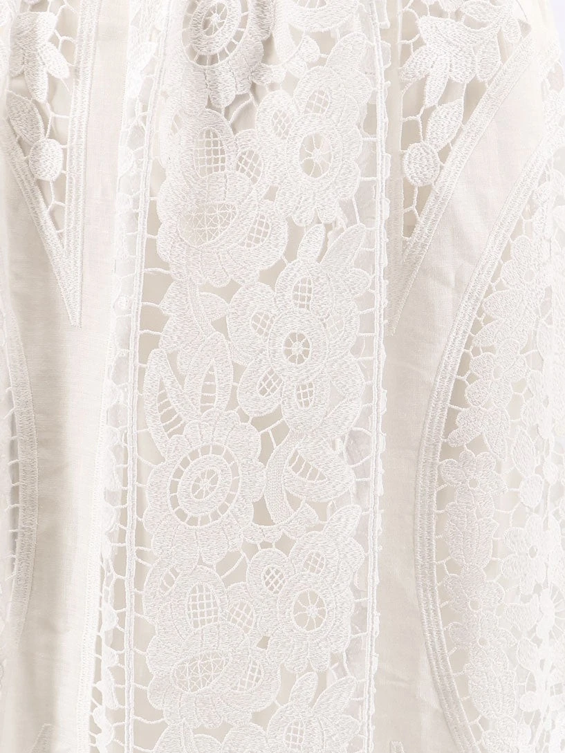 Linen and cotton skirt with laces embroidery.webp