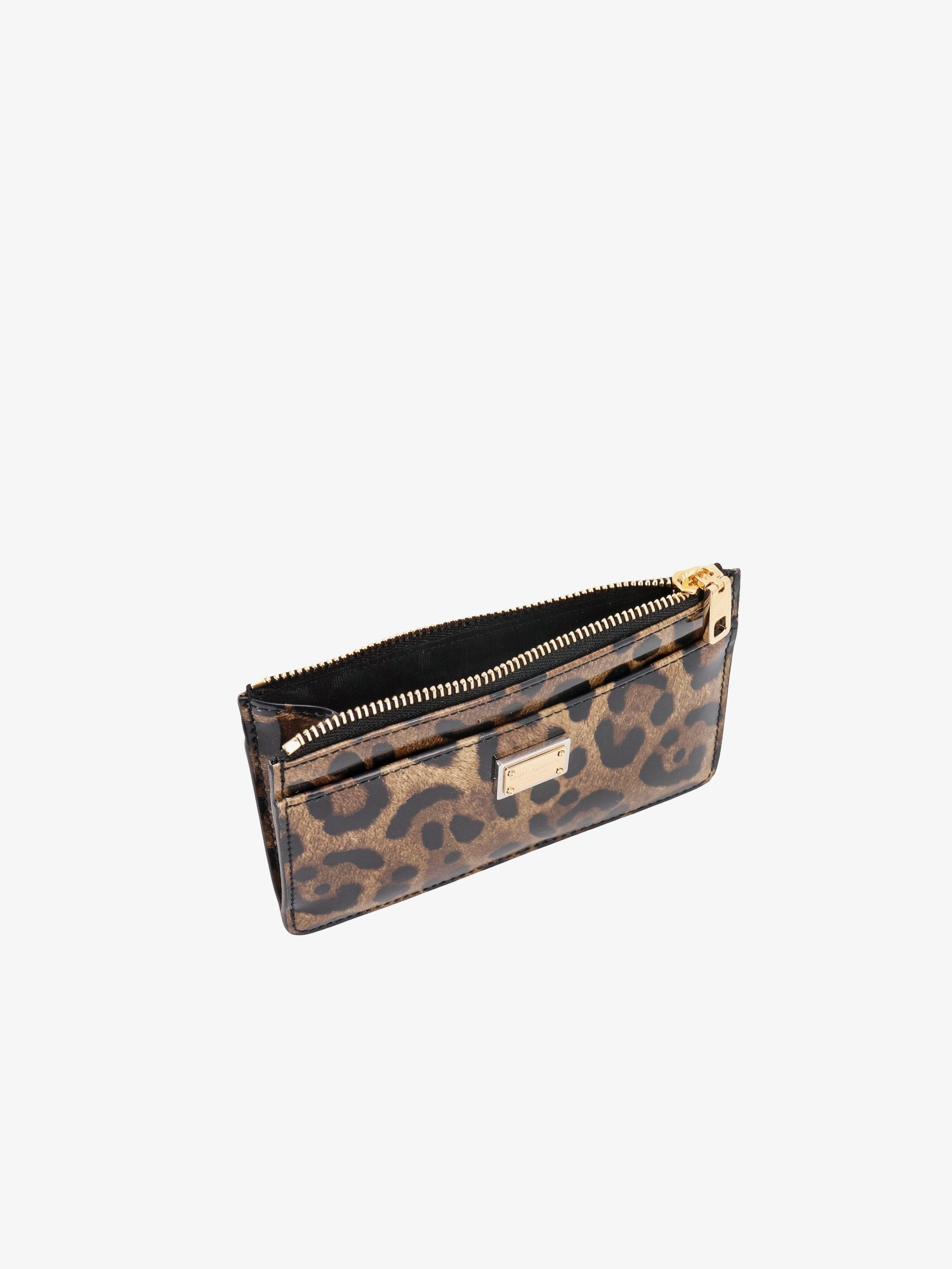 Patent leather card holder with animal print.webp