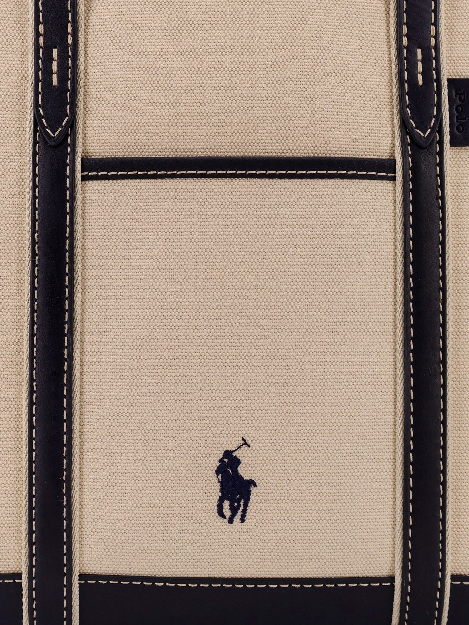 Canvas shoulder bag with embroidered logo on the front.webp