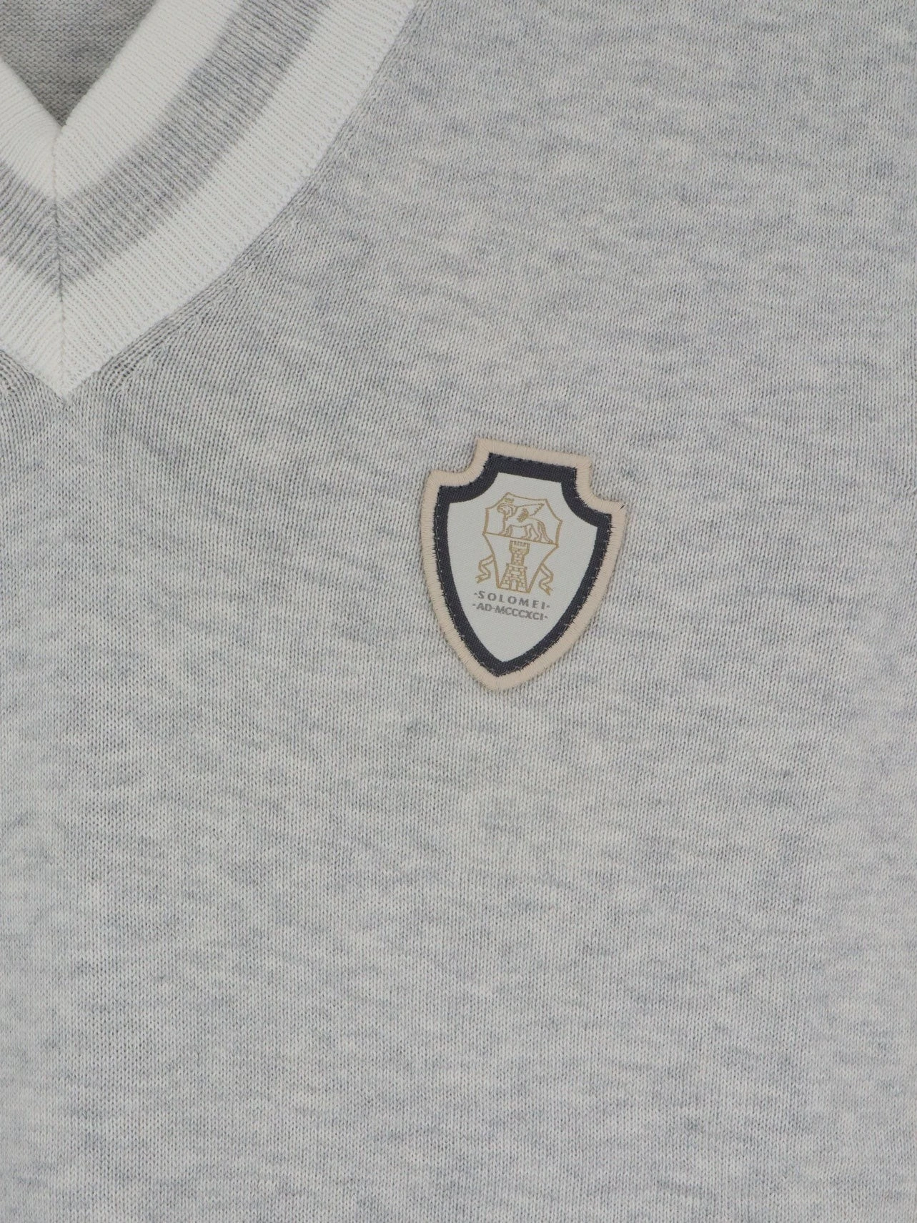 Cotton vest with front logo patch.webp