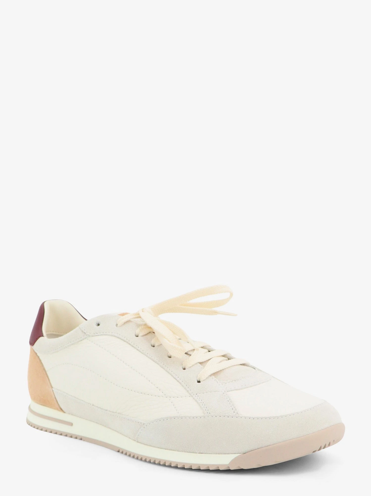 Leather sneakers with suede inserts.webp