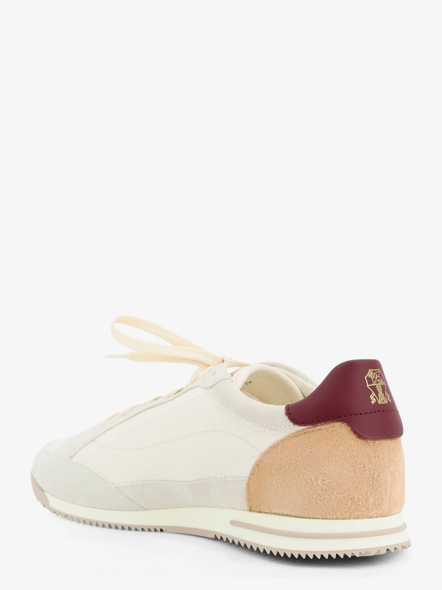 Leather sneakers with suede inserts.webp