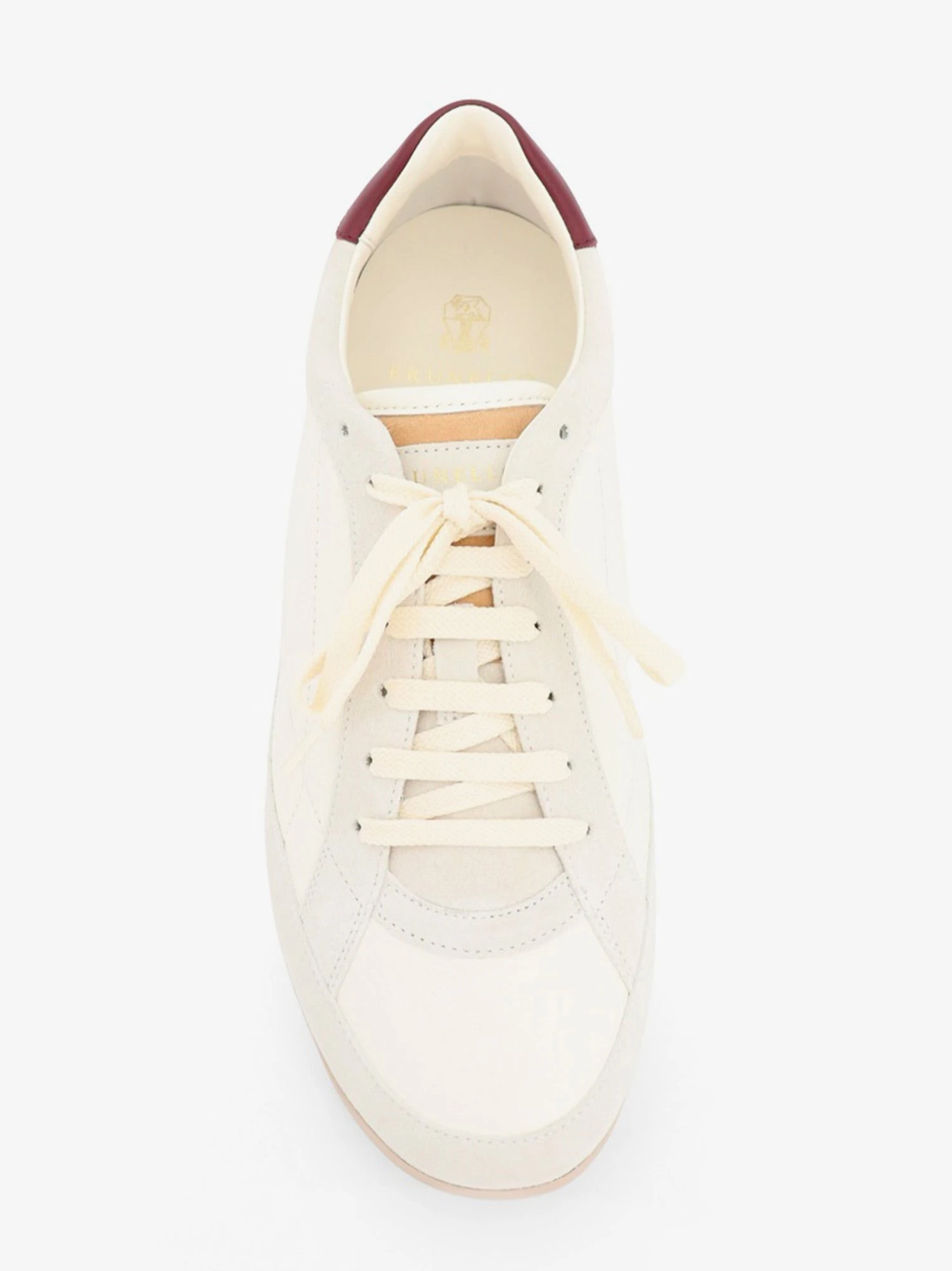 Leather sneakers with suede inserts.webp