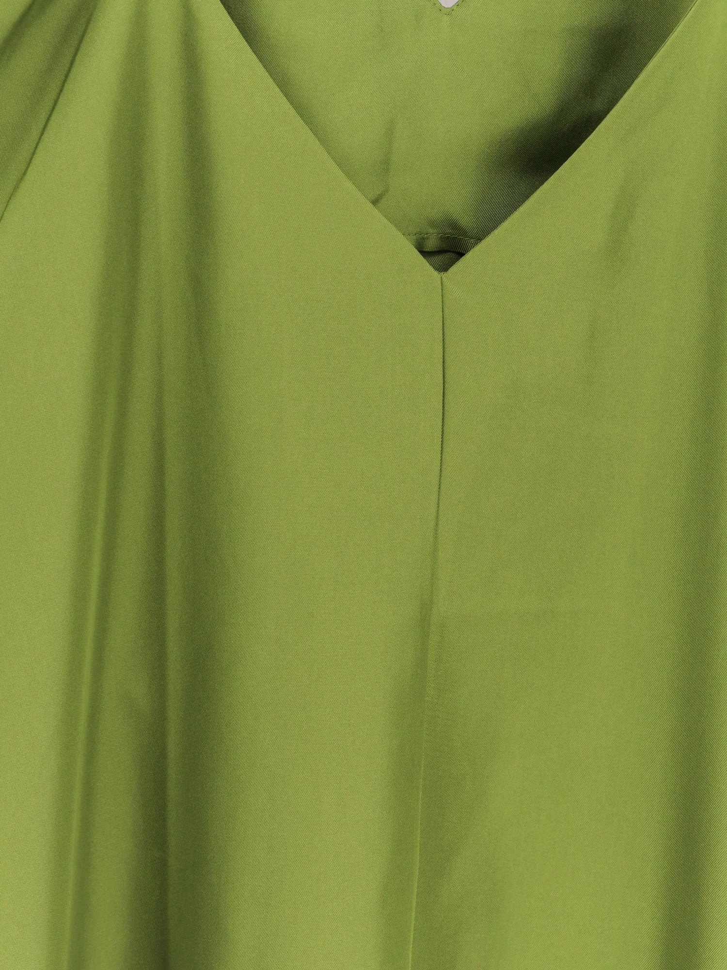 Silk dress with laces.webp