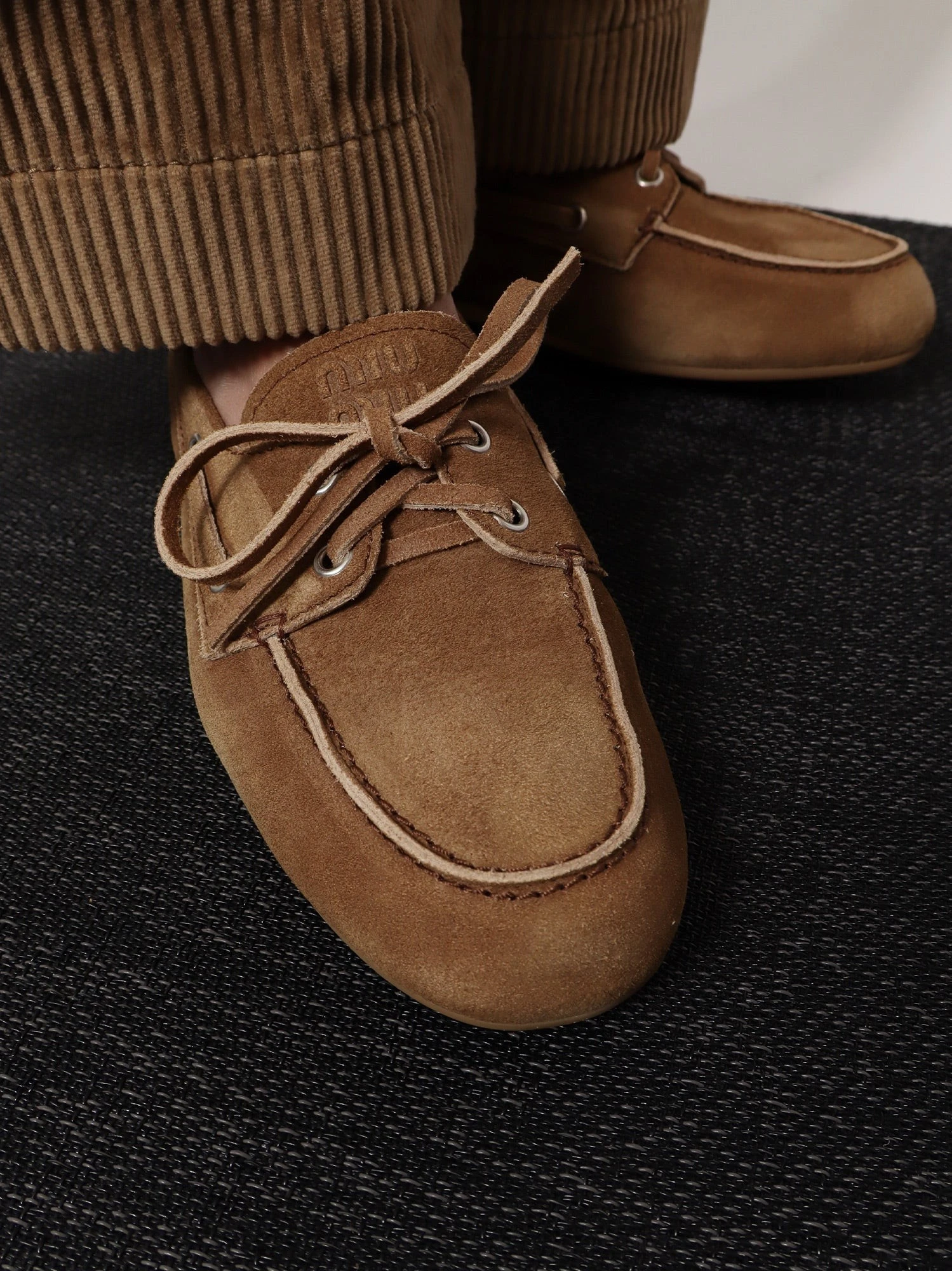 Suede loafers with embroidered logo.webp