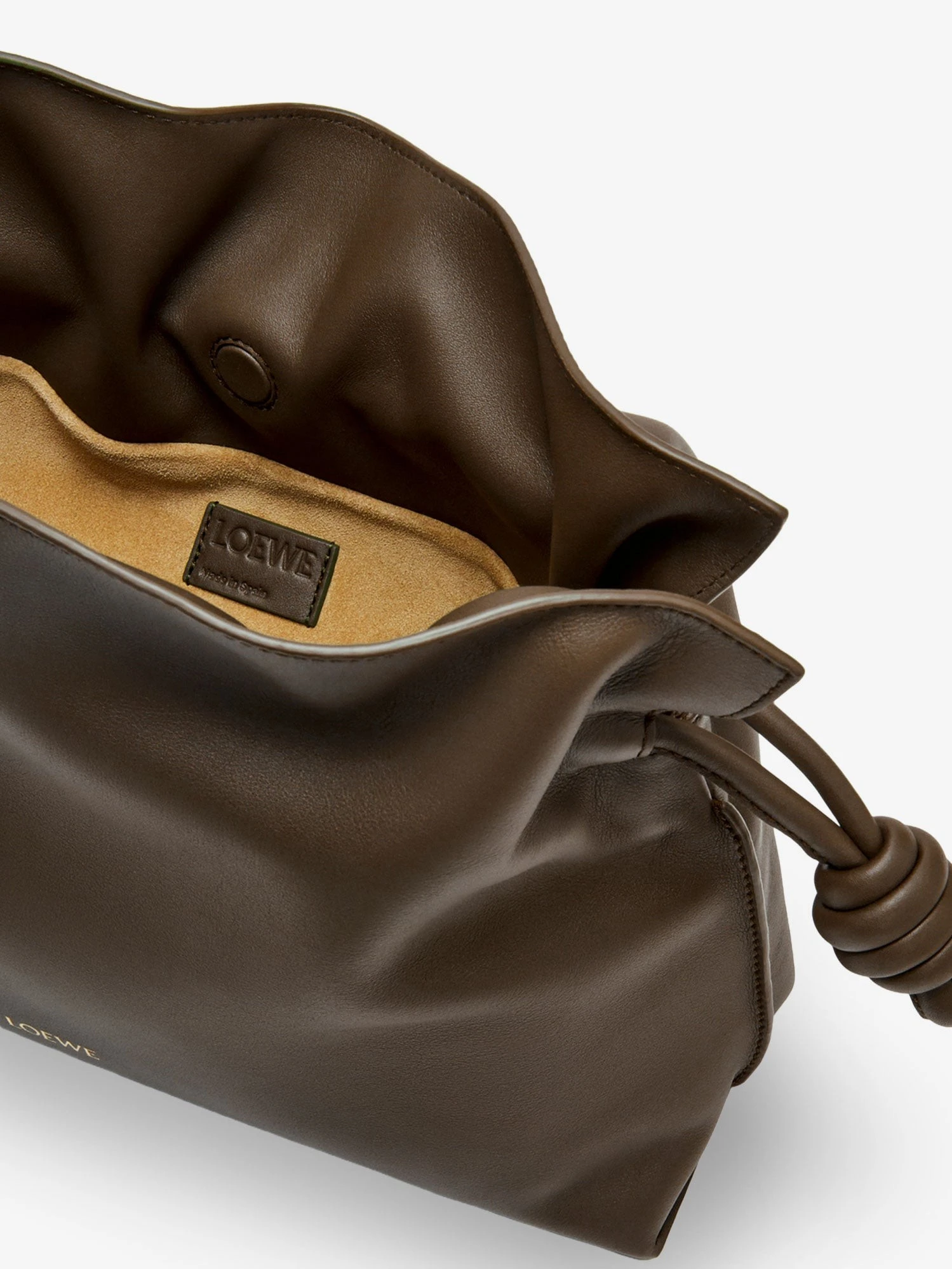 Flamenco leather clutch bag.webp