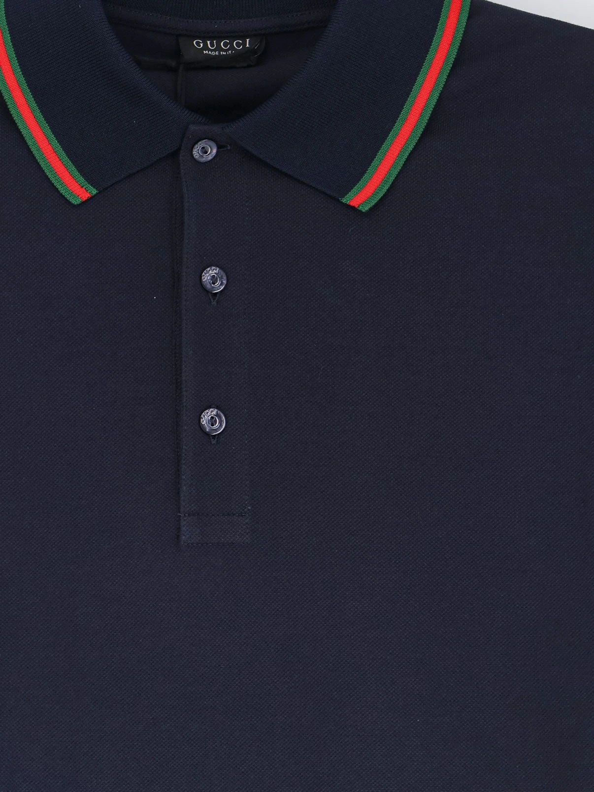 Cotton polo with Nastro Web detail on the collar.webp