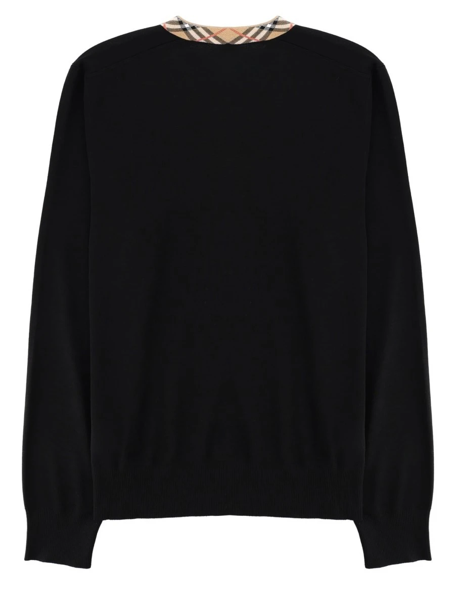MAGLIA IN LANA MERINO CON SCOLLO "CHECK".webp