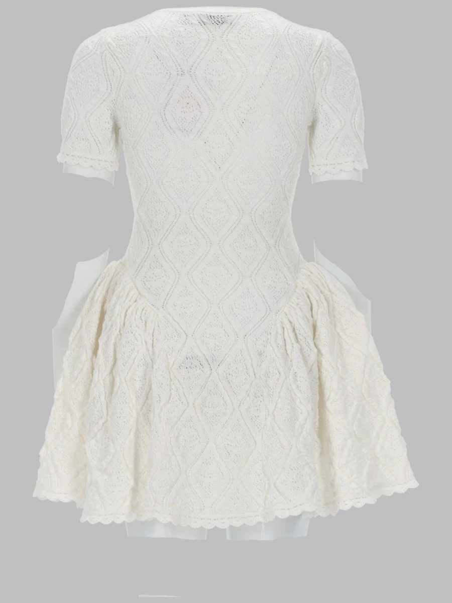 MINI ABITO SVASATO IN MAGLIA TRAFORATA.webp