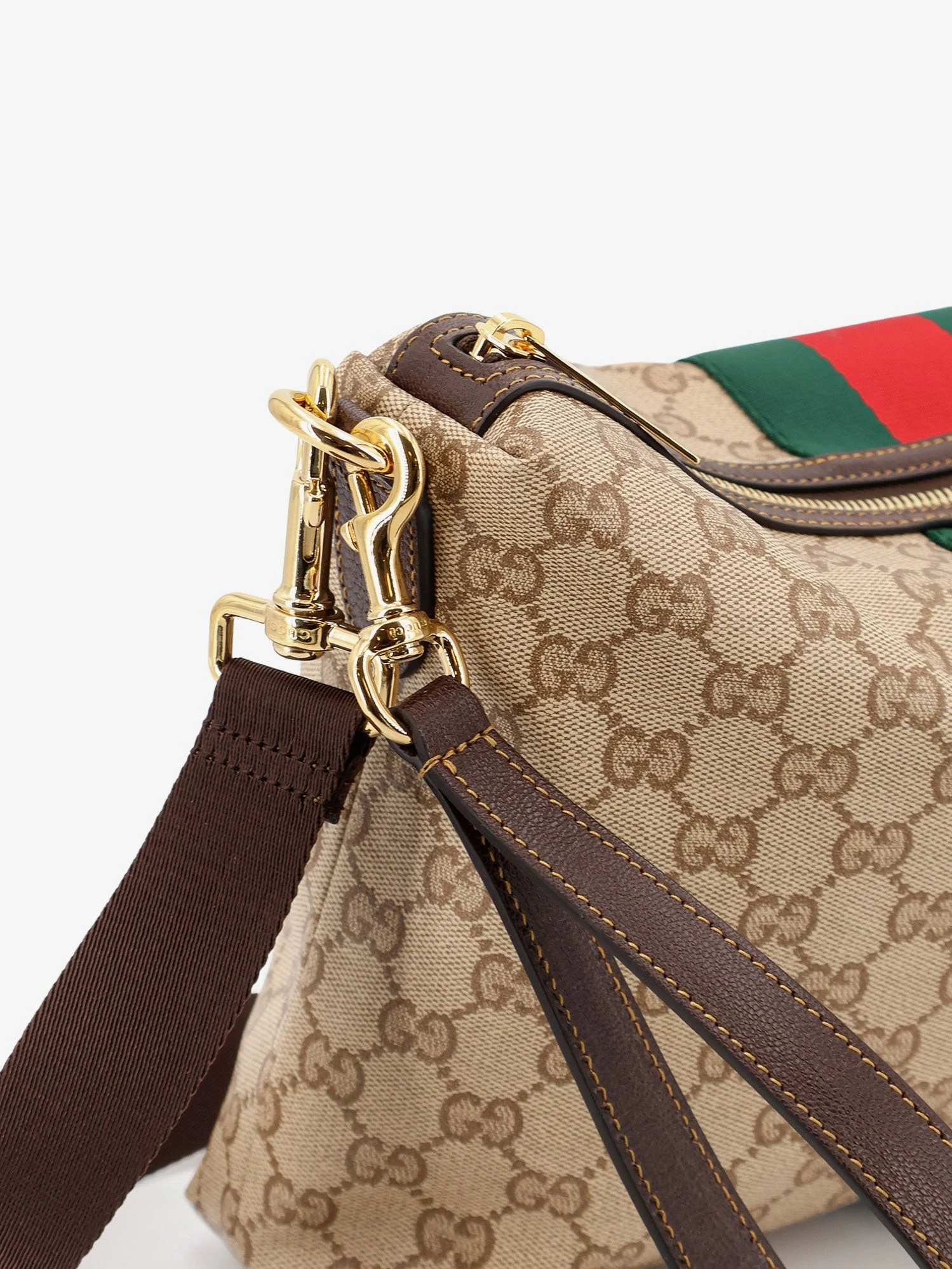 GG canvas crossbody bag with Nastro Web on the front.webp